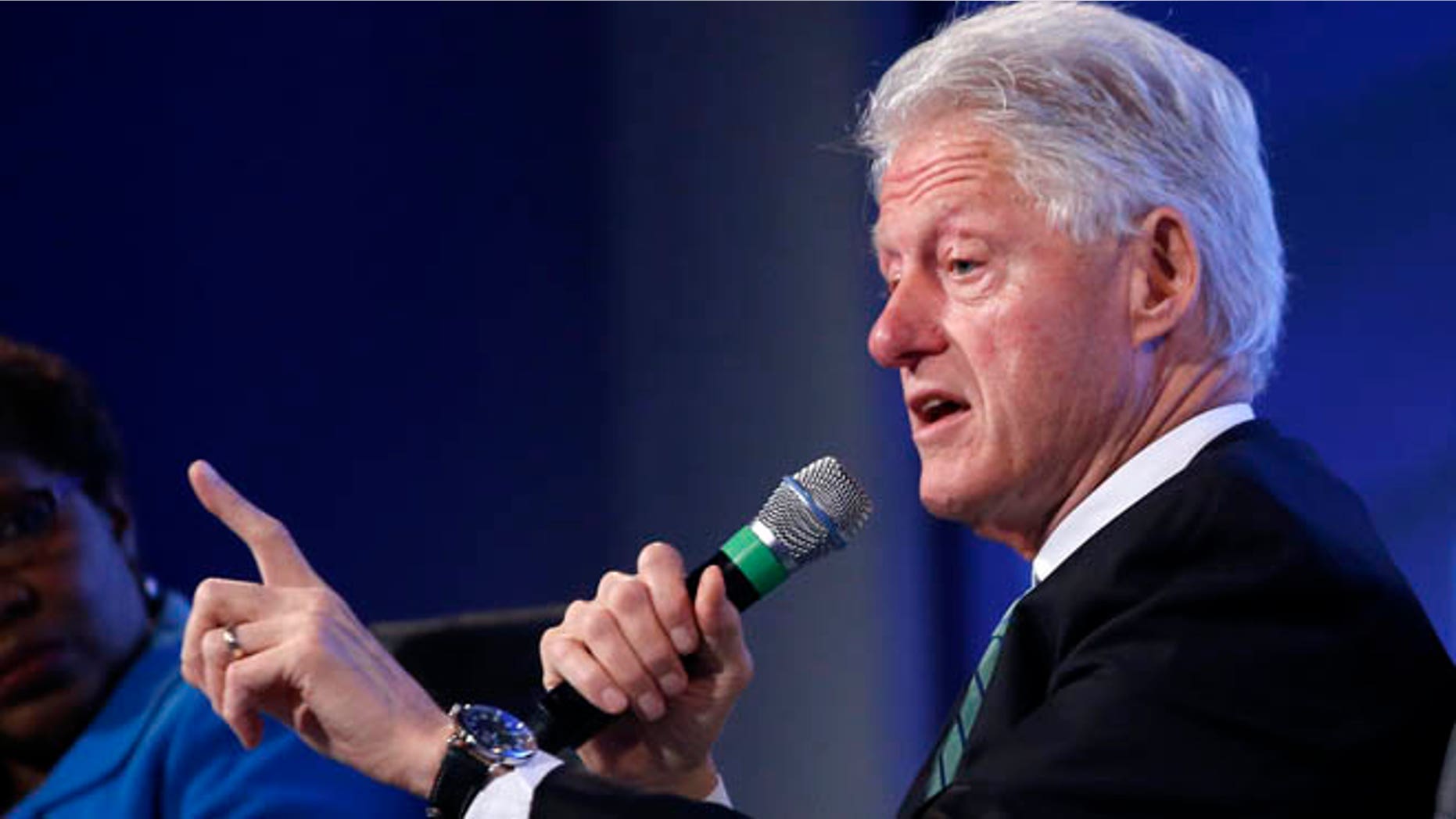 May 14, 2014: Former President Bill Clinton answers questions at the 2014 Fiscal Summit organized by the Peter G. Peterson Foundation in Washington.