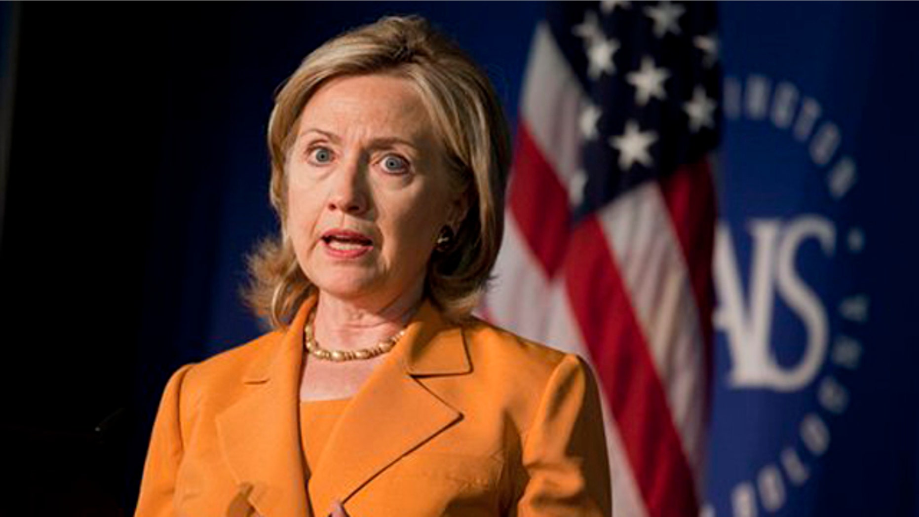 Secretary of State Hillary Clinton gestures while speaking about the global health initiative Aug. 16 in Washington. (AP Photo)