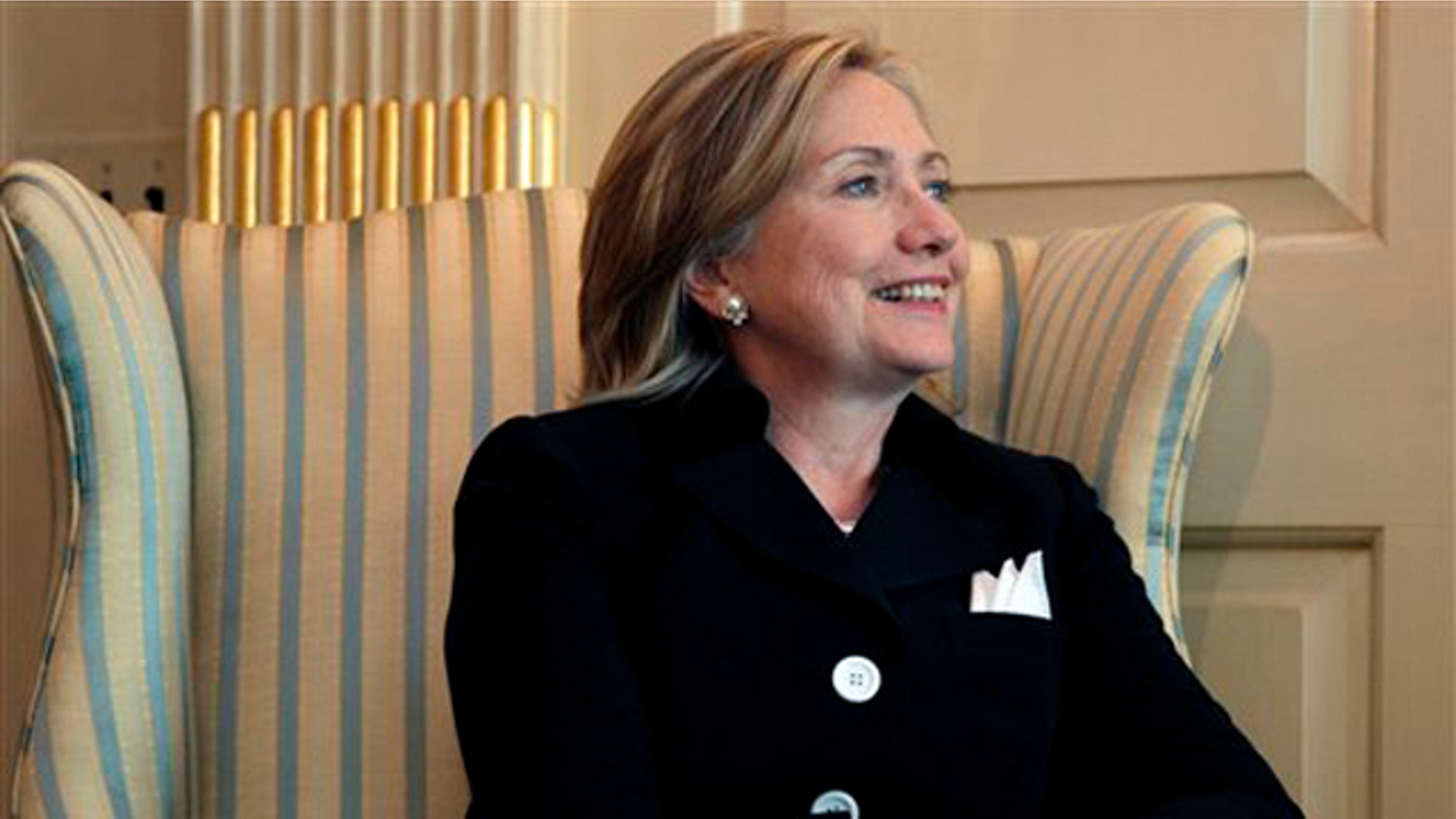 Secretary of State Hillary Rodham Clinton looks to Former British Prime Minister Tony Blair, not seen, as they meet Aug. 31 at the State Department in Washington. (AP Photo)