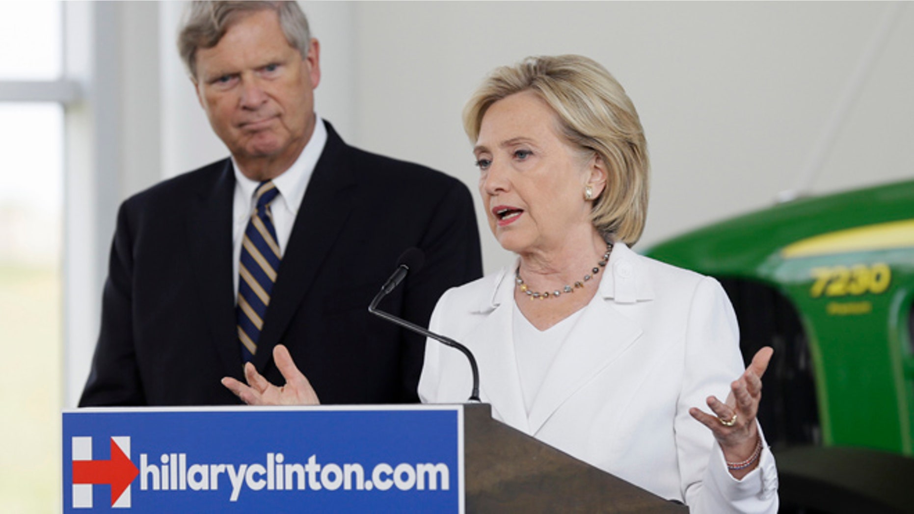 Aug 26, 2015: Democratic presidential candidate Hillary Rodham Clinton, accompanied by Agriculture Secretary Tom Vilsack, speaks during a news conference at the Des Moines Area Community College in Ankeny, Iowa. (AP)