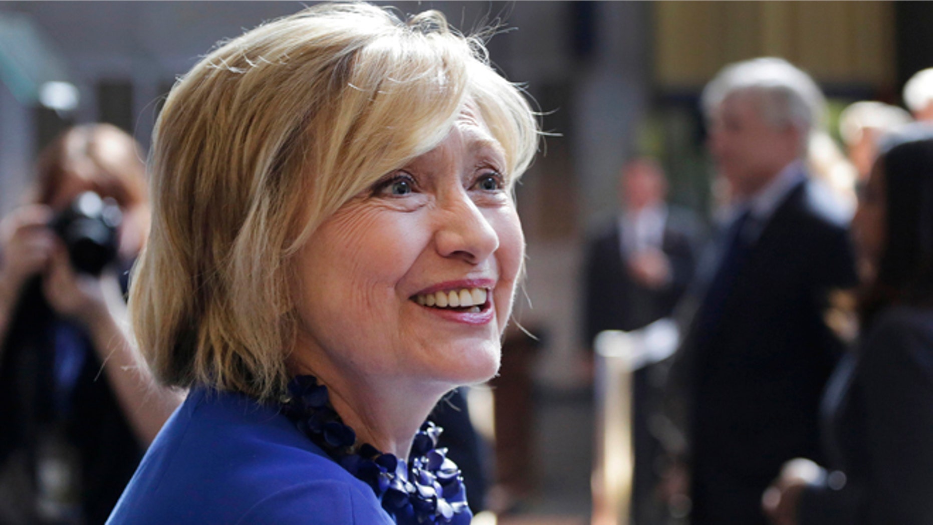 April 29, 2015,: Hillary Rodham Clinton, a 2016 Democratic presidential contender, greets members of the audience following her speech at the David N. Dinkins Leadership and Public Policy Forum in New York.