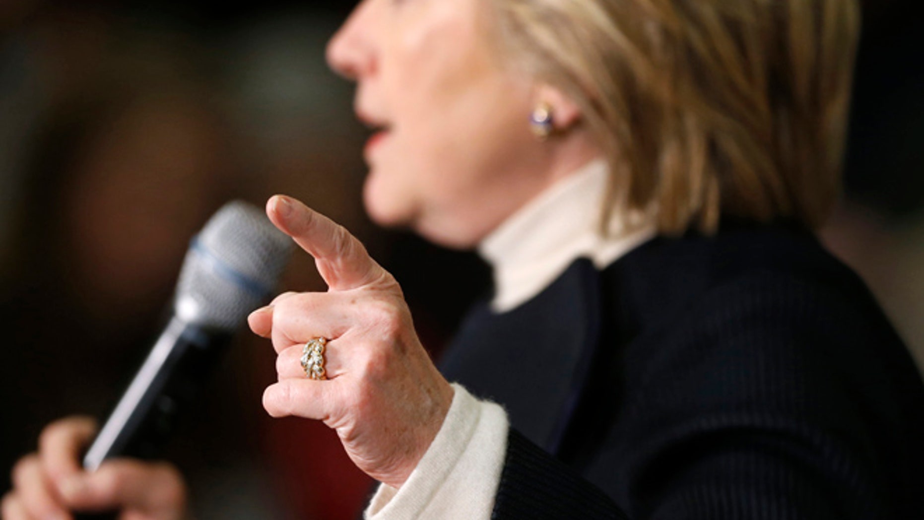 Jan. 18, 2015: Democratic presidential candidate Hillary Clinton gestures as she speaks at a town hall at the Toledo Civic Center in Toledo, Iowa.