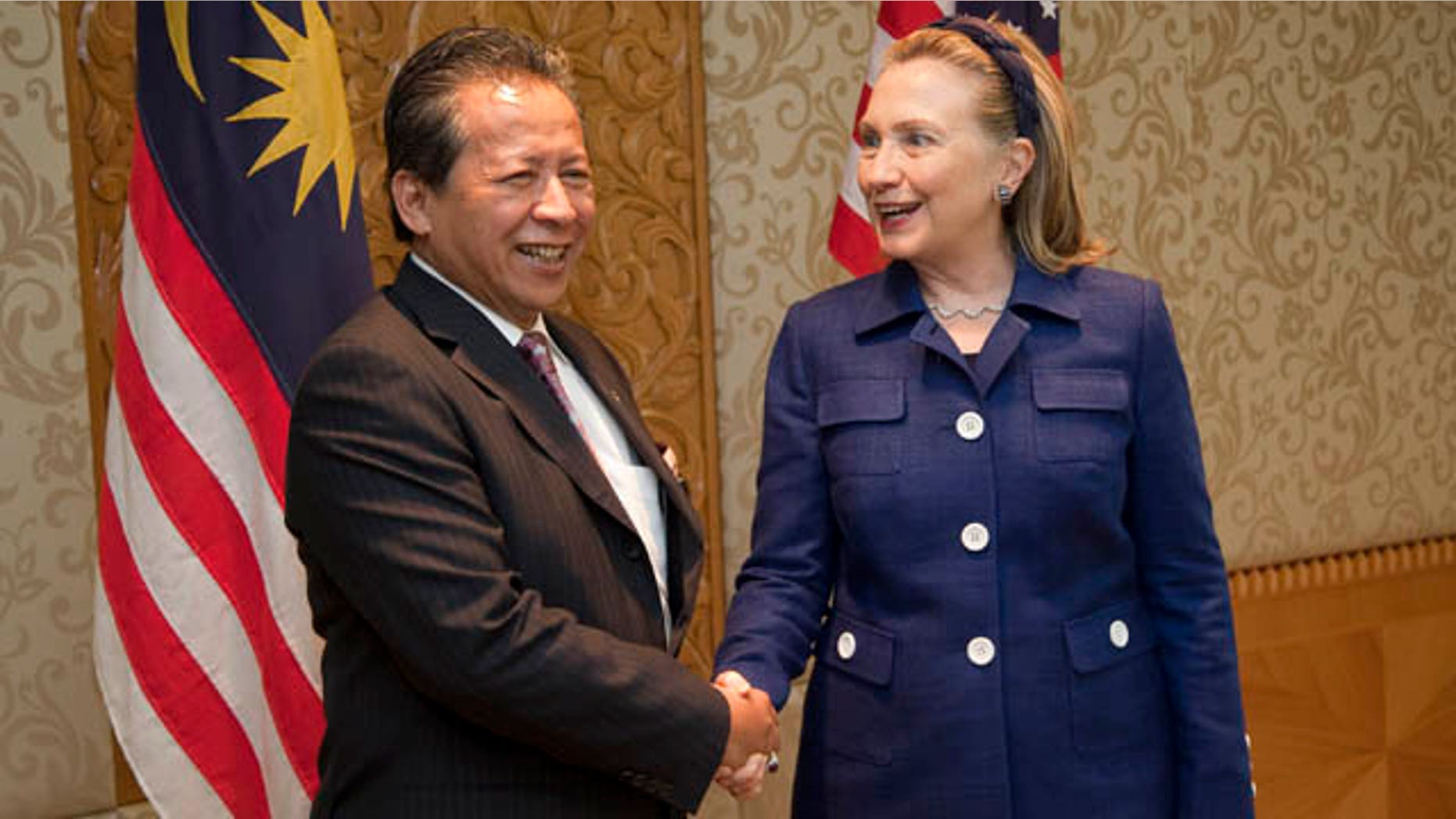 Nov. 2: U.S. Secretary of State Hillary Rodham Clinton, shakes hands with Malaysian Foreign Minister Anifah Aman at the Ministry of Foreign Affairs in Kuala Lumpur, Malaysia.