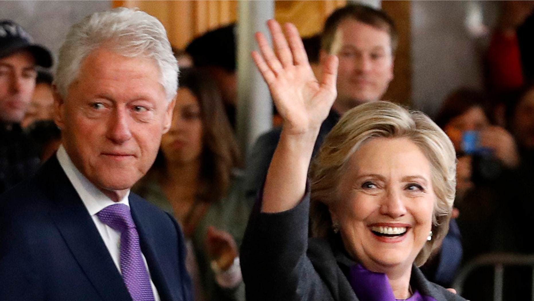 Hillary Clinton departs a Manhattan hotel with her husband, former U.S. President Bill Clinton, on Nov. 9, 2016.