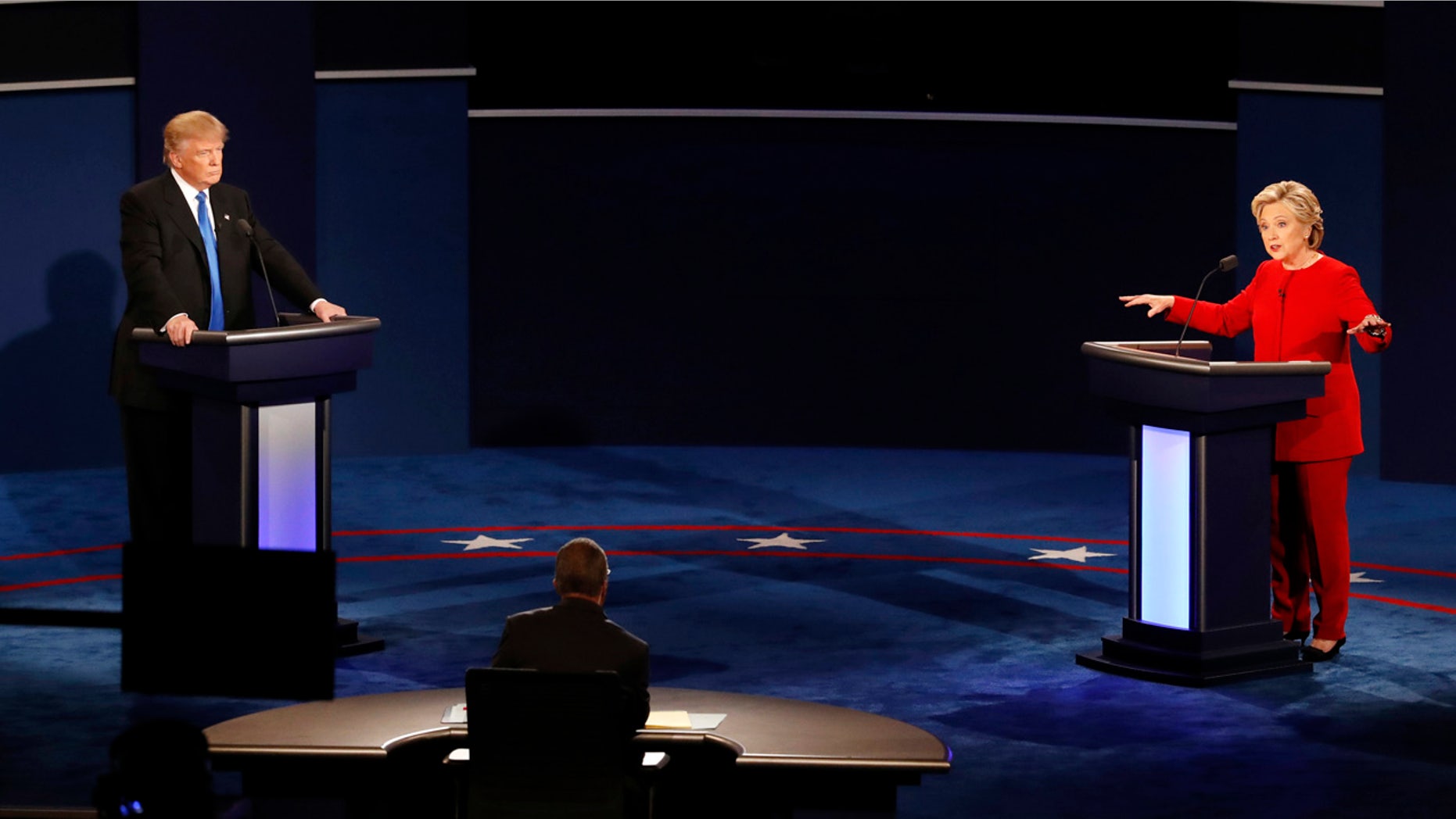 Democratic presidential nominee Hillary Clinton gestures as she appears on stage with Republican presidential nominee Donald Trump during the presidential debate at Hofstra University in Hempstead, N.Y., Monday, Sept. 26, 2016.