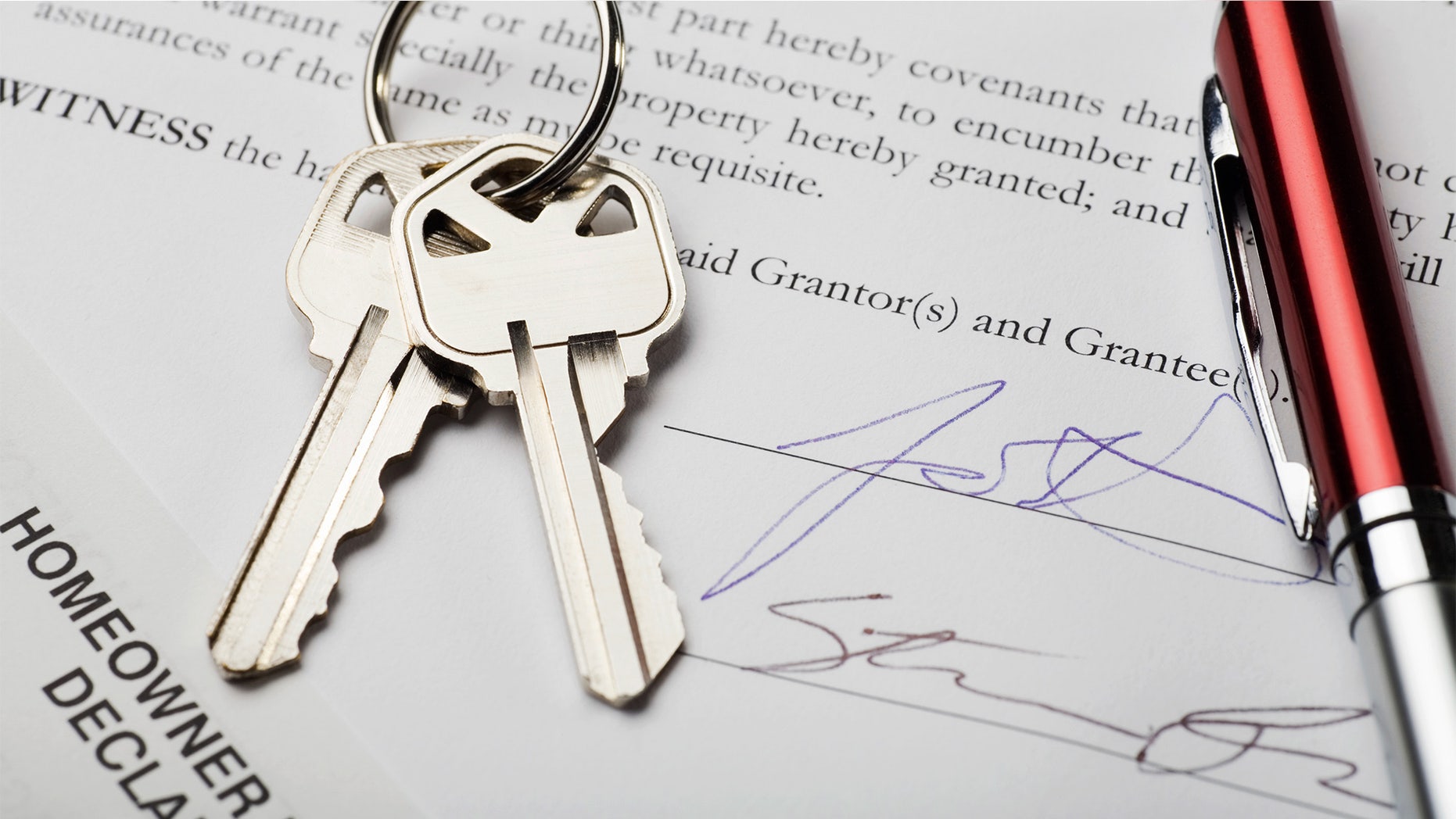 Signatures on new home documents