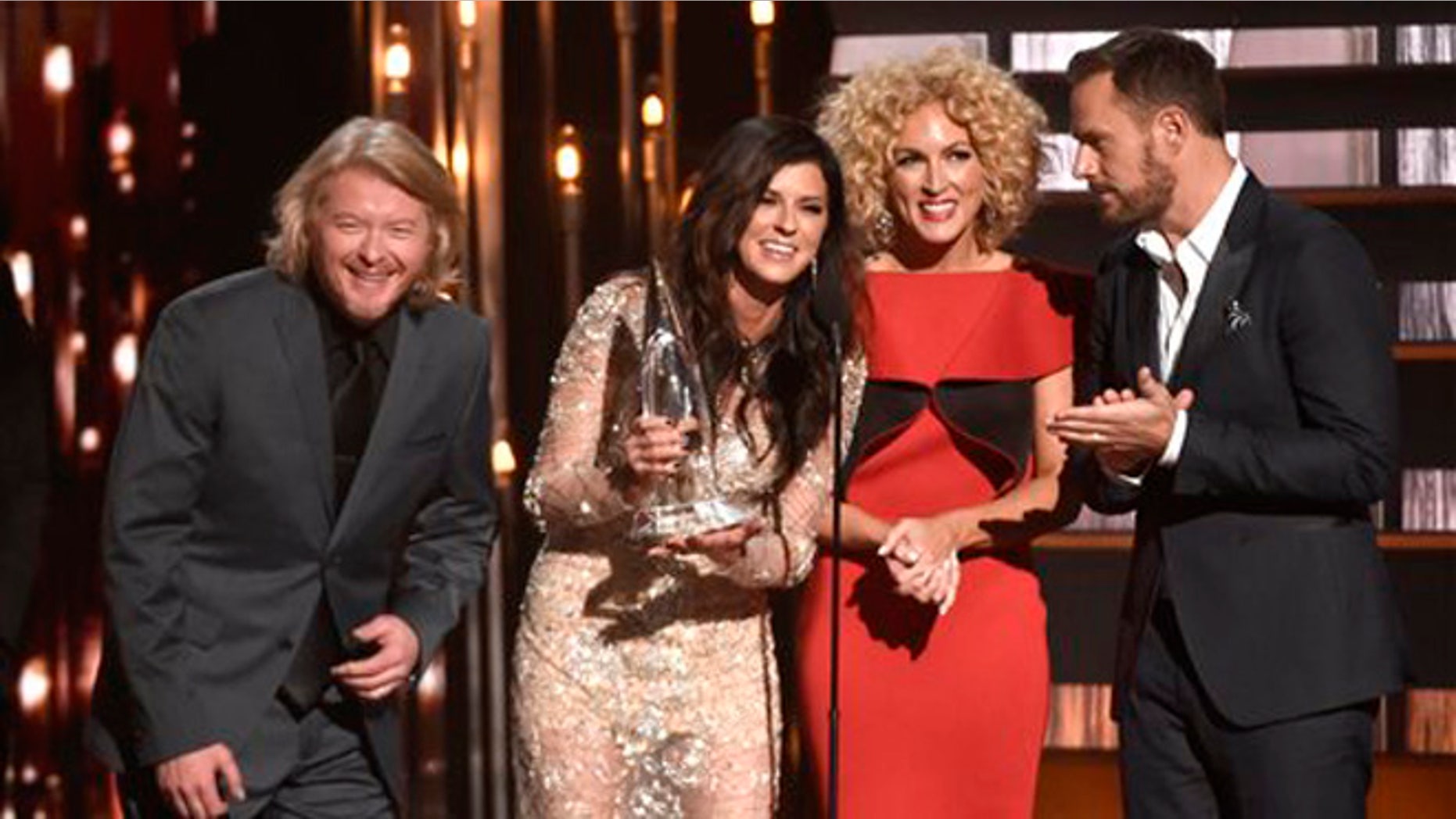 Nov. 4, 2015: Phillip Sweet, from left, Karen Fairchild, Kimberly Schlapman and Jimi Westbrook, of Little Big Town, accept the award for single of the year for Girl Crush at the 49th annual CMA Awards at the Bridgestone Arena in Nashville, Tenn.