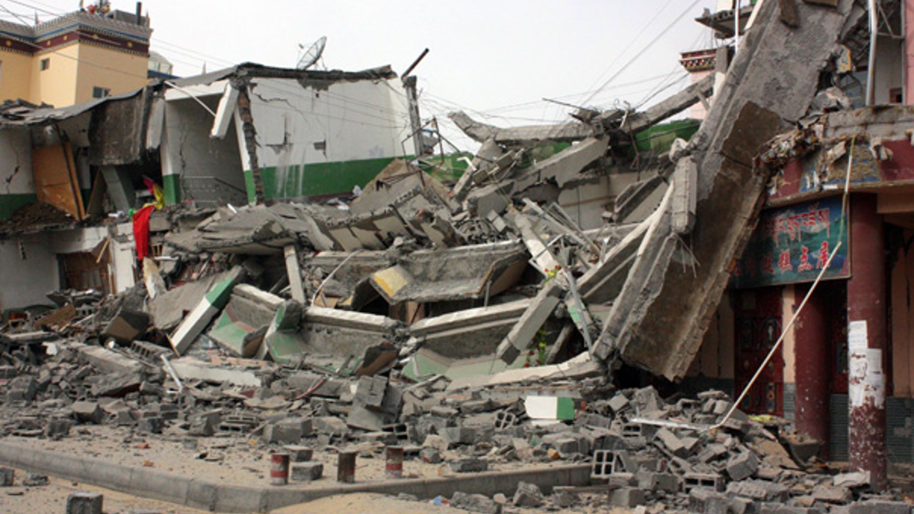 Apr. 14: A building is destroyed by the earthquake in Jiegu Town, western Qinghai Province, China.