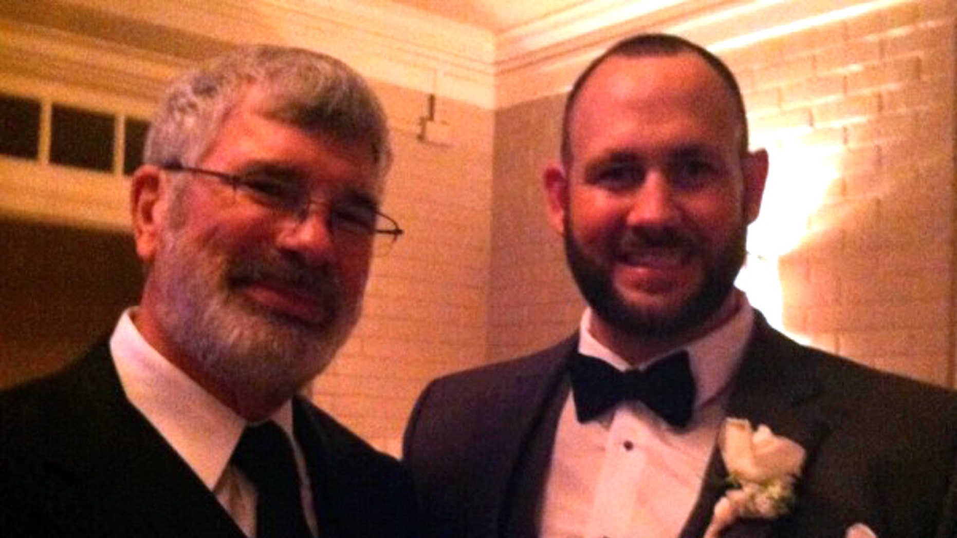 Coach McWilliams, left, pictured with Coach Beeler at his wedding.
