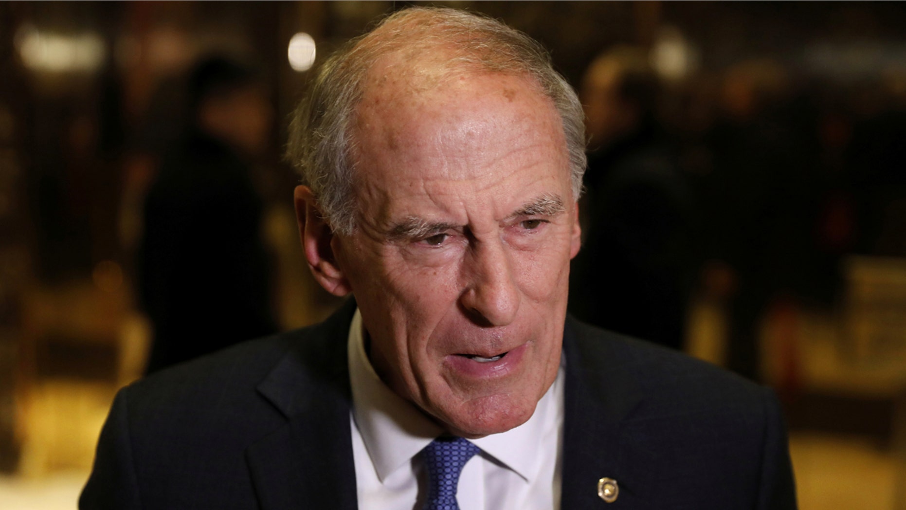 Former Sen. Dan Coats (R-IN) stops to speak to the news media after a meeting at Trump Tower with U.S. President-elect Donald Trump in New York, U.S., November 30, 2016.