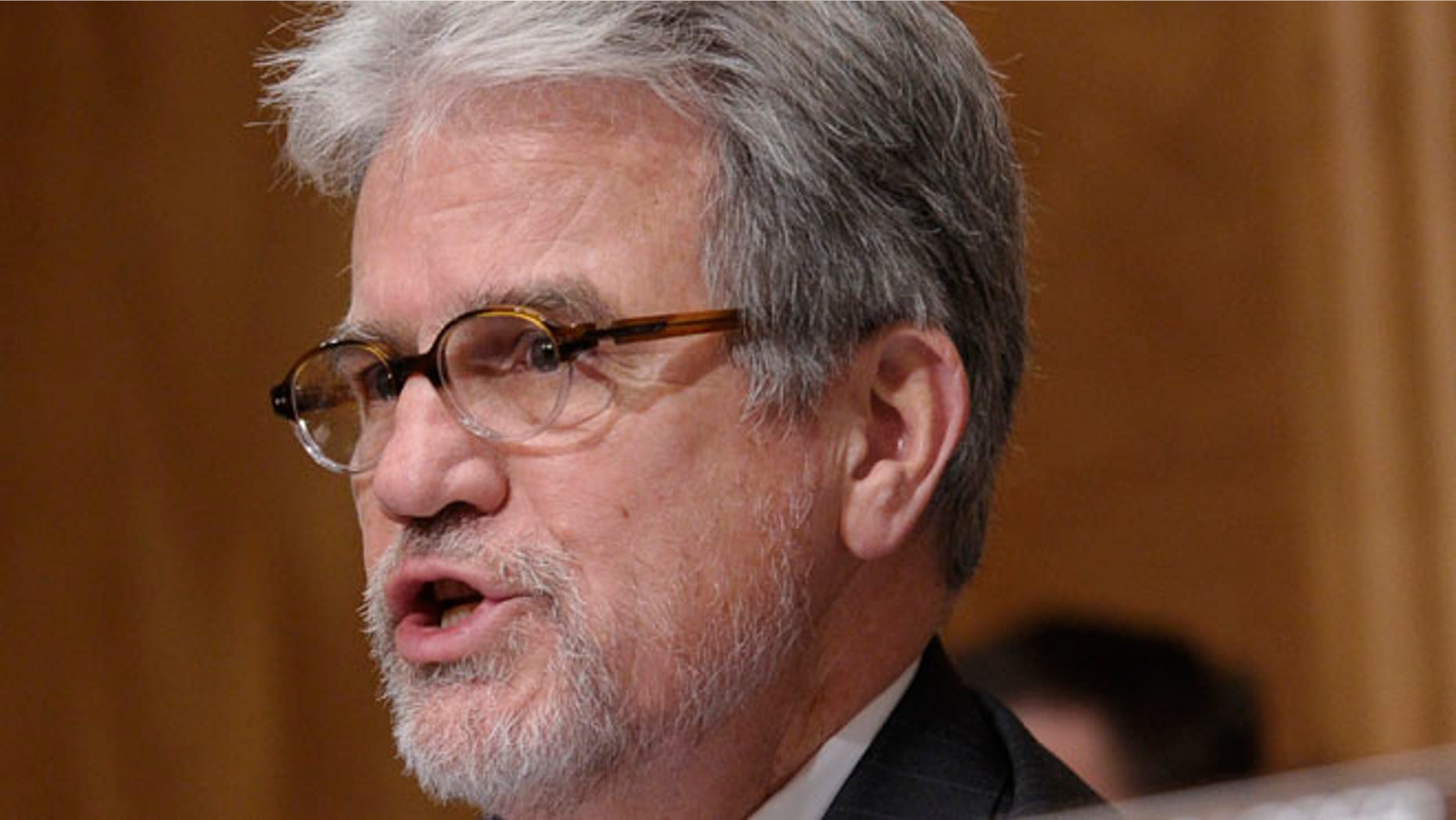 Dec. 17, 2013: Sen. Tom Coburn, R-Okla., speaks on Capitol Hill in Washington.