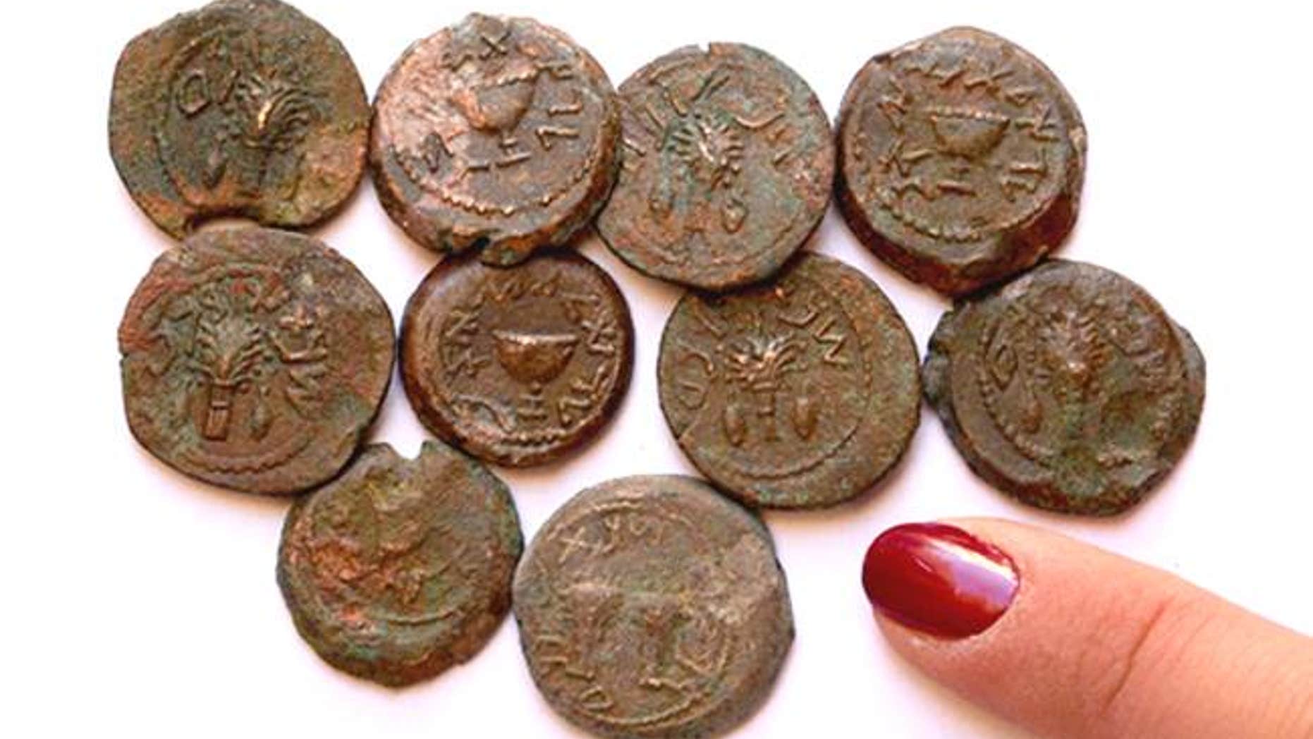 The coins are the last remnants of an ancient Jewish revolt against the Roman Empire (Eilat Mazar/ Hebrew University)