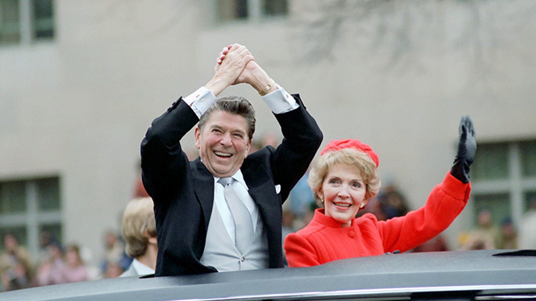File photo: Ronald and Nancy Reagan wave from the limousine during their inaugural parade in Washington, D.C., U.S. in January 1981. (Ronald Reagan Presidential Library/Handout via REUTERS)