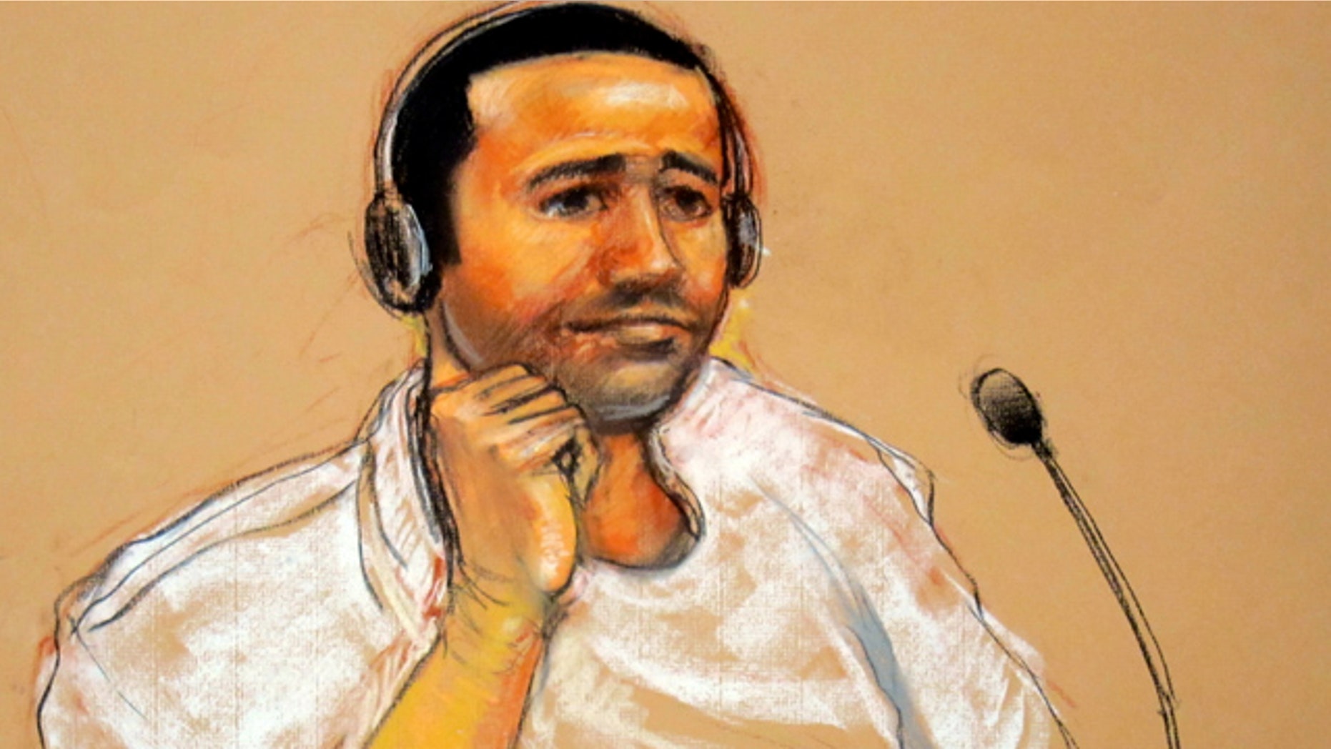 Nov. 9: In this sketch by courtroom artist Janet Hamlin, reviewed by the U.S. military, Abd al-Rahim al-Nashiri is seen during his military commissions arraignment at the Guantanamo Bay.