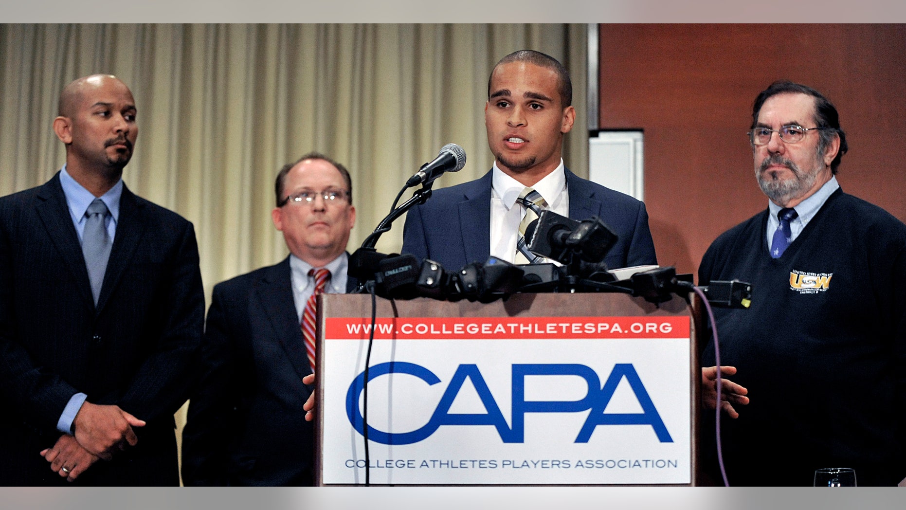 Jan. 28, 2014: Northwestern quarterback Kain Colter second from right, speaks while College Athletes Players Association president Ramogi Huma left, United Steel Workers National Political Director Tim Waters second from left, and United Steel Workers president Leo Gerard right, look on during a news conference in Chicago.