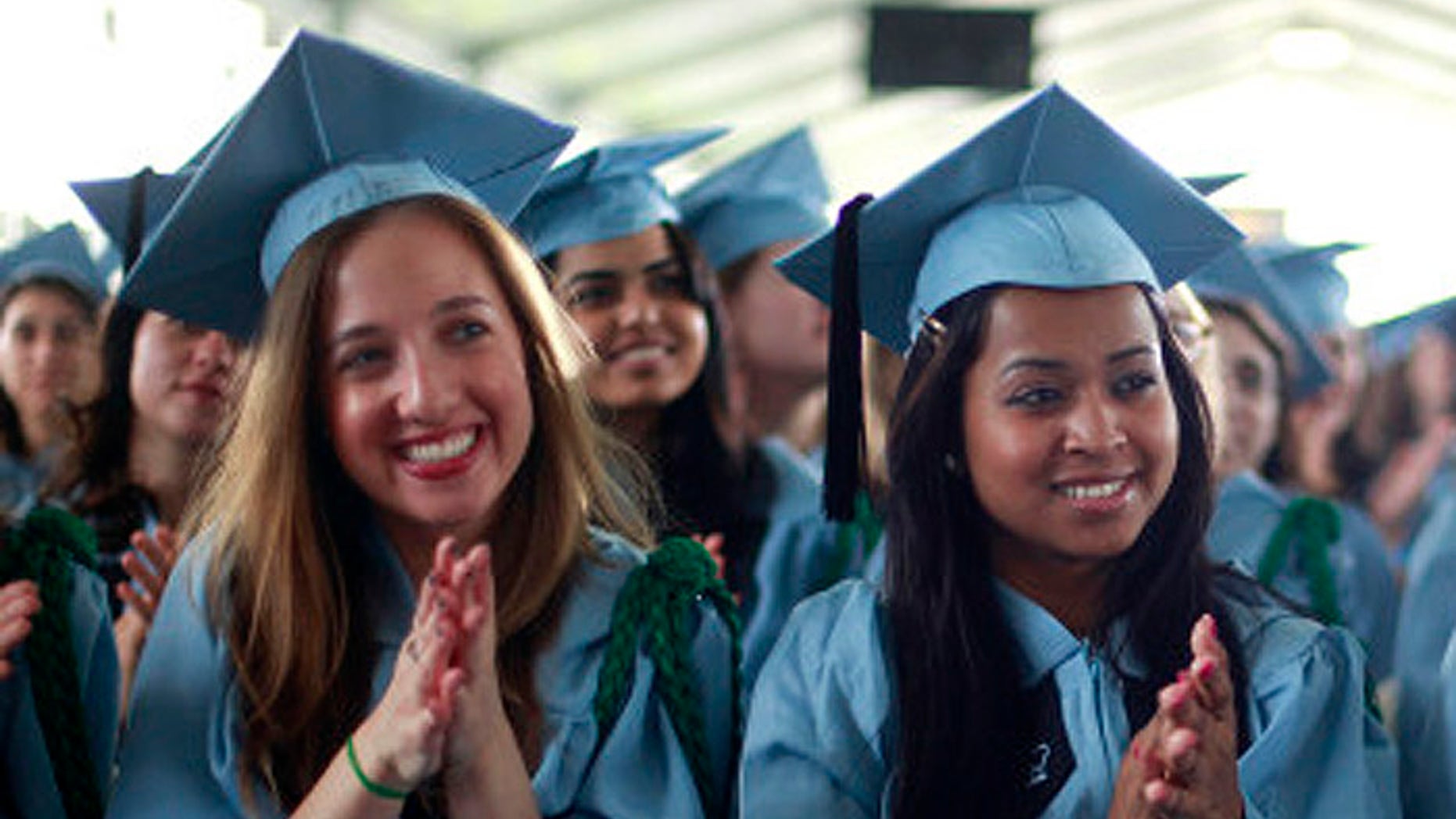 A gender gap is widening among members of Generation X when it comes to getting a college degree. (AP file)