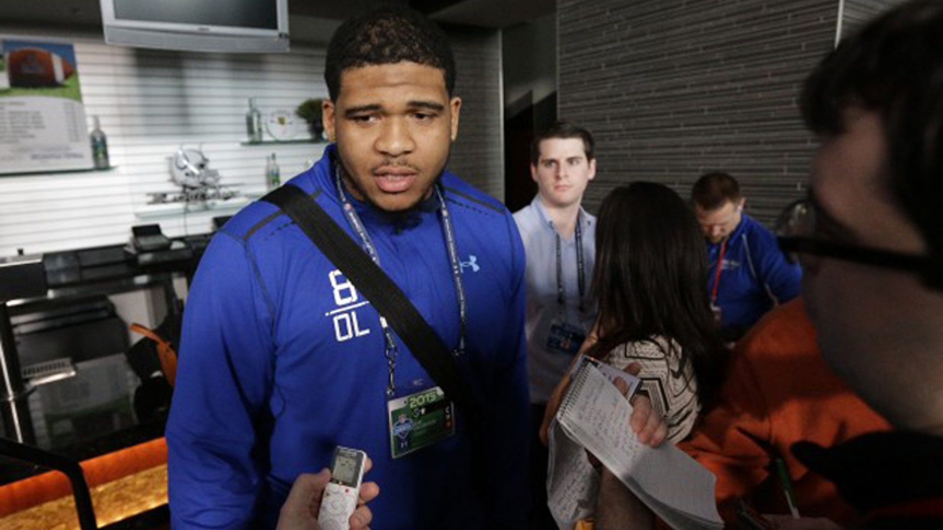 La’el Collins is considered one of the top prospects in Thursday's NFL draft. Baton Rouge police reportedly want to question him after a pregnant woman's murder. He is not a suspect.