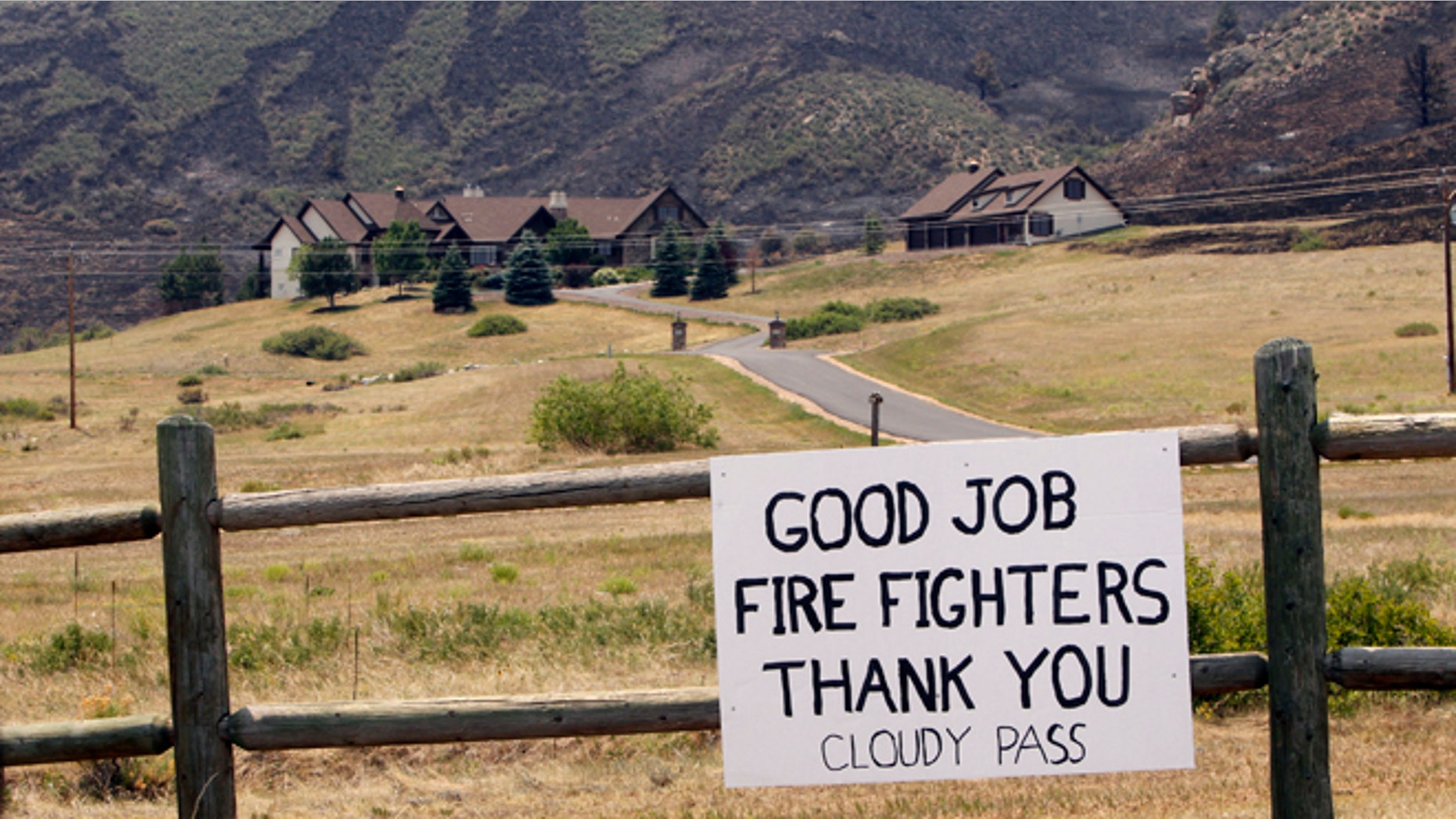 June 18: A sign thanking firefighters near Bellvue, Colo.