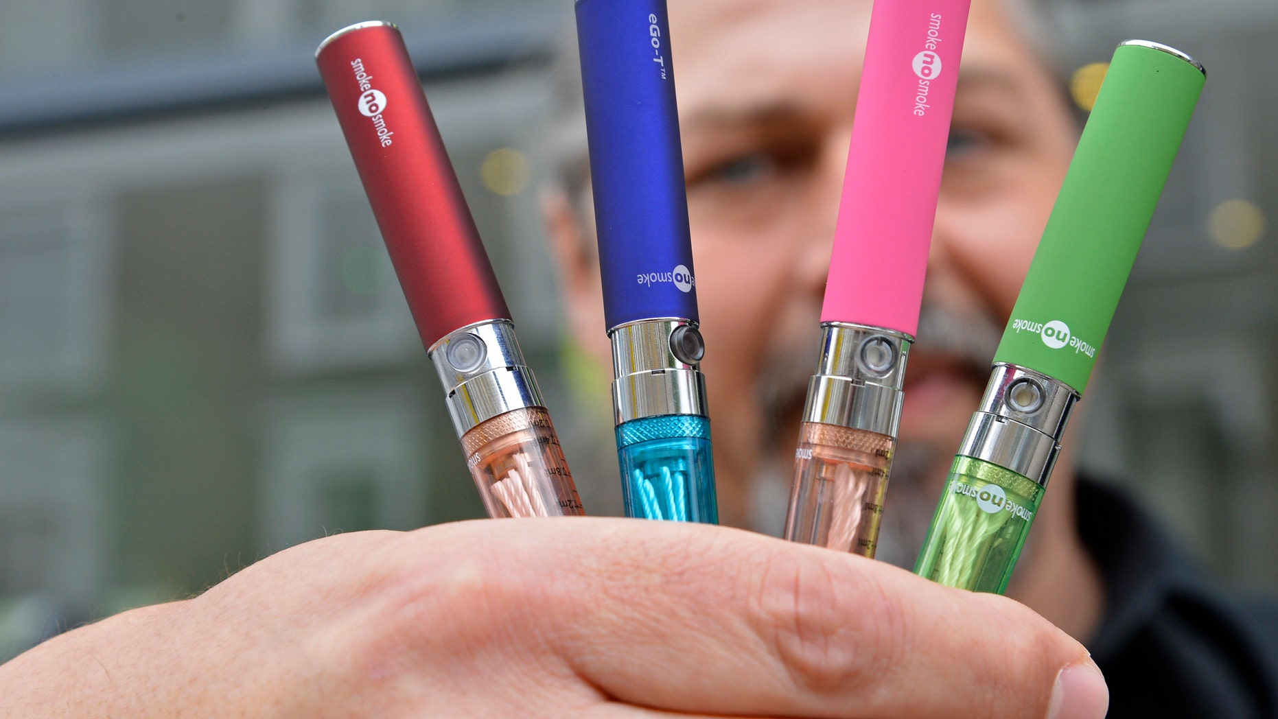 The use of e-cigarettes, shown here, is on the rise among teens.