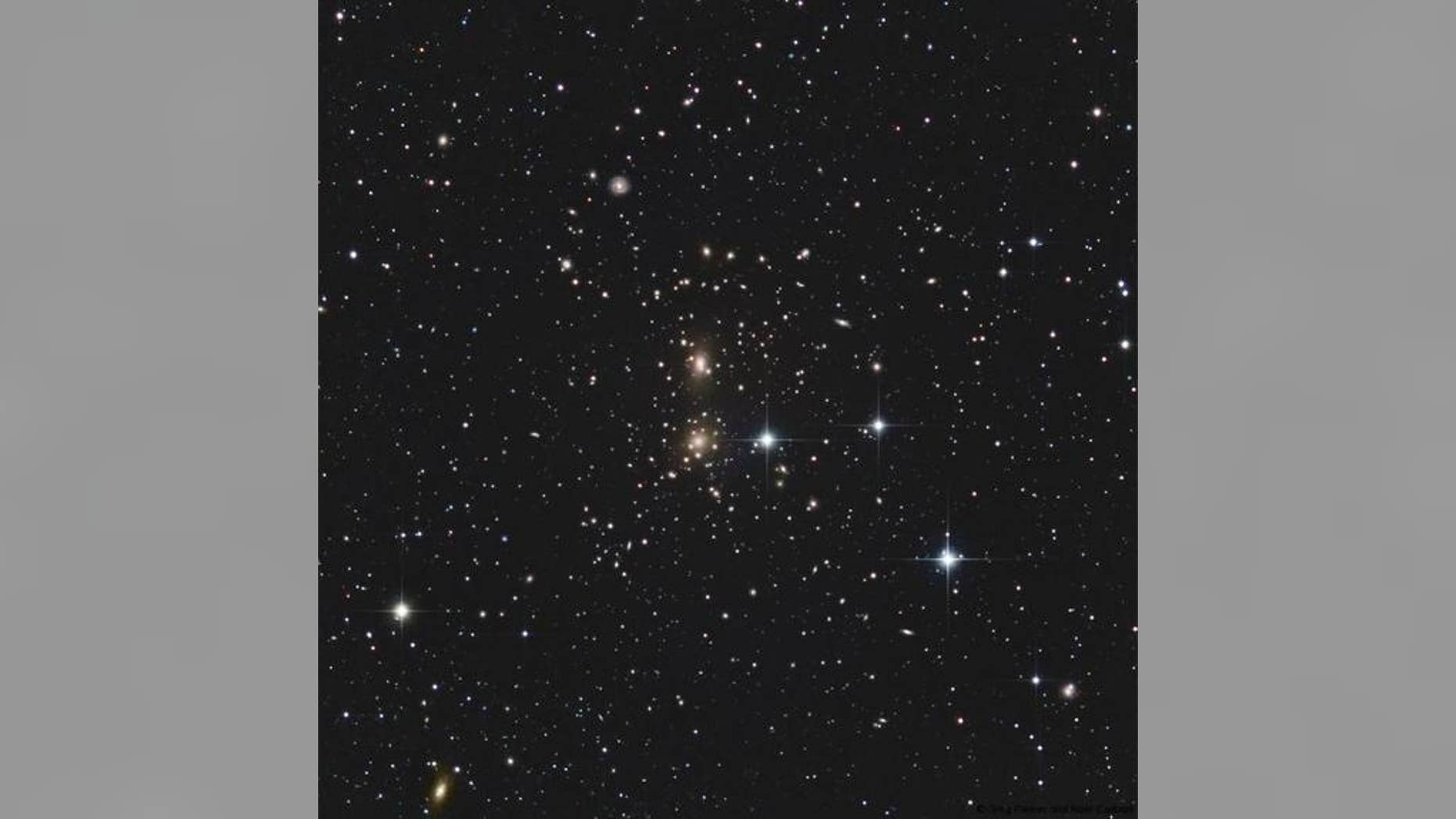 The Coma galaxy cluster is a collection of more than 650 galaxies about 300 million light-years from Earth in the constellation Coma Berenices. Also known as Abell 1656, the galaxy cluster is one of the densest ones known.