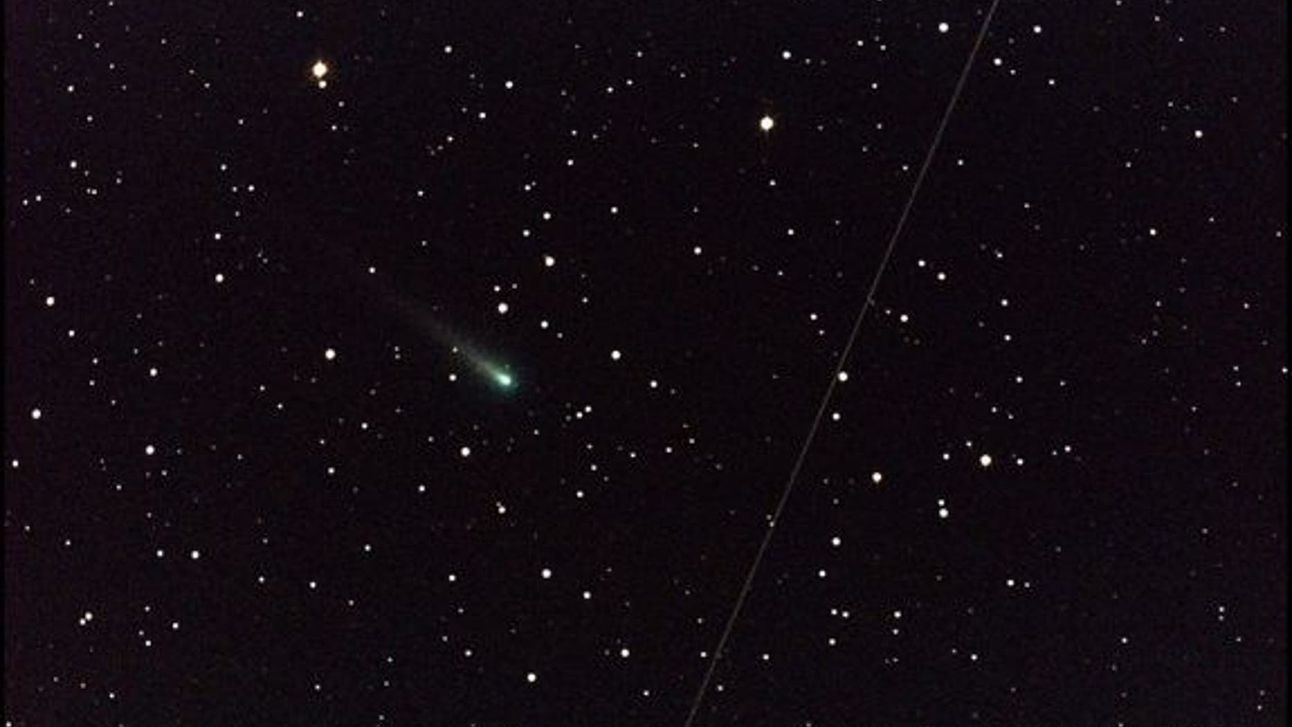 In the early morning of Oct. 25, 2013, NASA's Marshall Space Flight Center in Huntsville, Ala., used a 14" telescope to capture this image of Comet ISON (the greenish object just left of center) cruising through the constellation of Leo the Lio