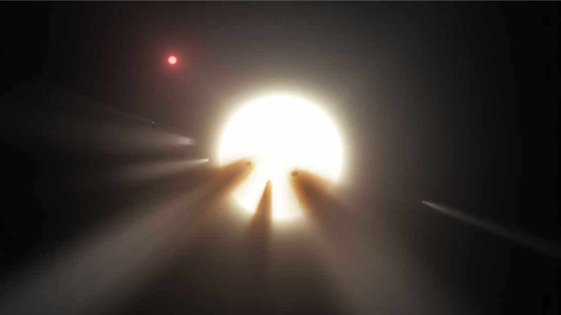 This artist's illustration shows comet fragments crossing the face of a star, one possible explanation for the strange dimming exhibited by "Boyajian's star."