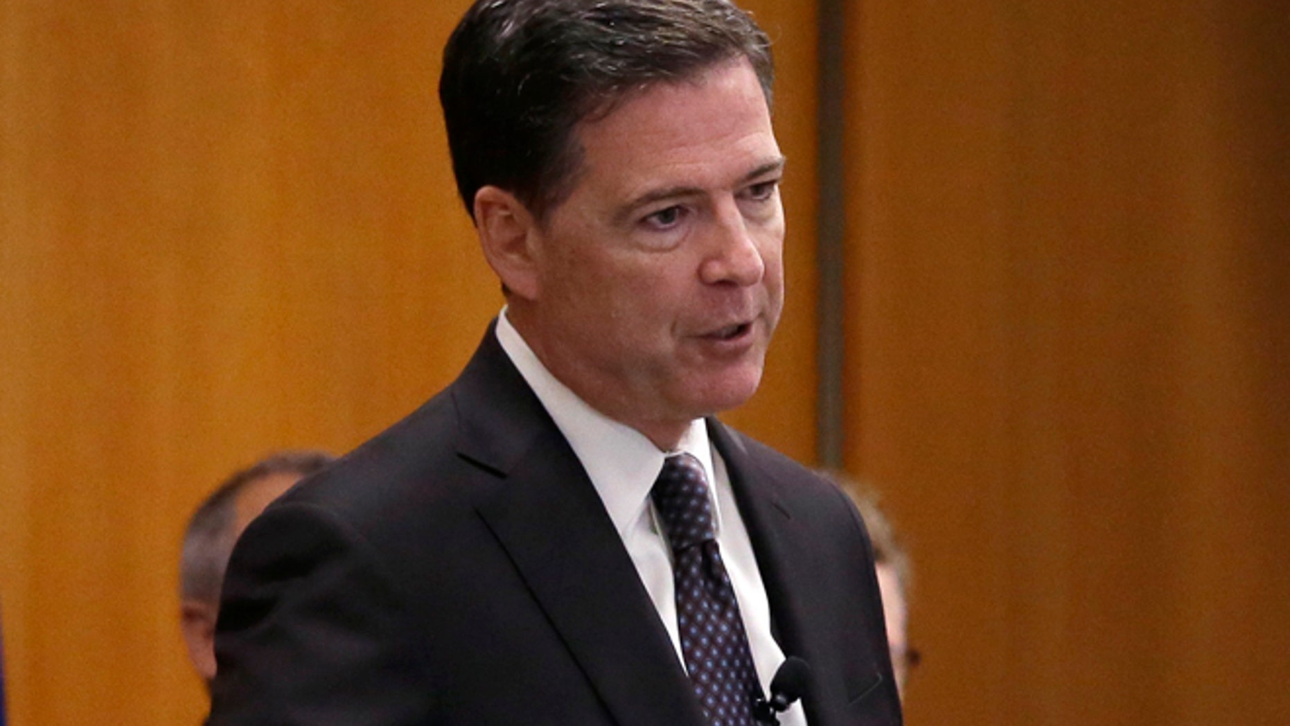 April 5, 2016: FBI Director James Comey addresses the media after visiting with employees and other law enforcement officials in Detroit. (AP Photo)
