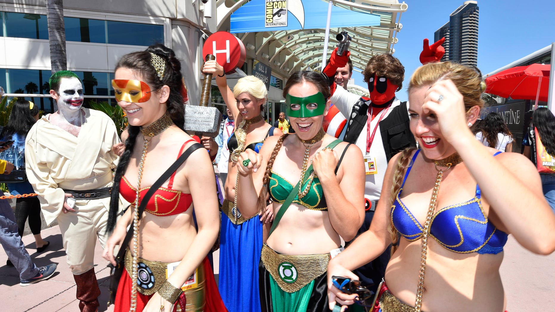 Costumed characters walk outside of the convention center on day 1 of the 2014 Comic-Con International Convention held Thursday, July 24, 2014 in San Diego. (Photo by Denis Poroy/Invision/AP)