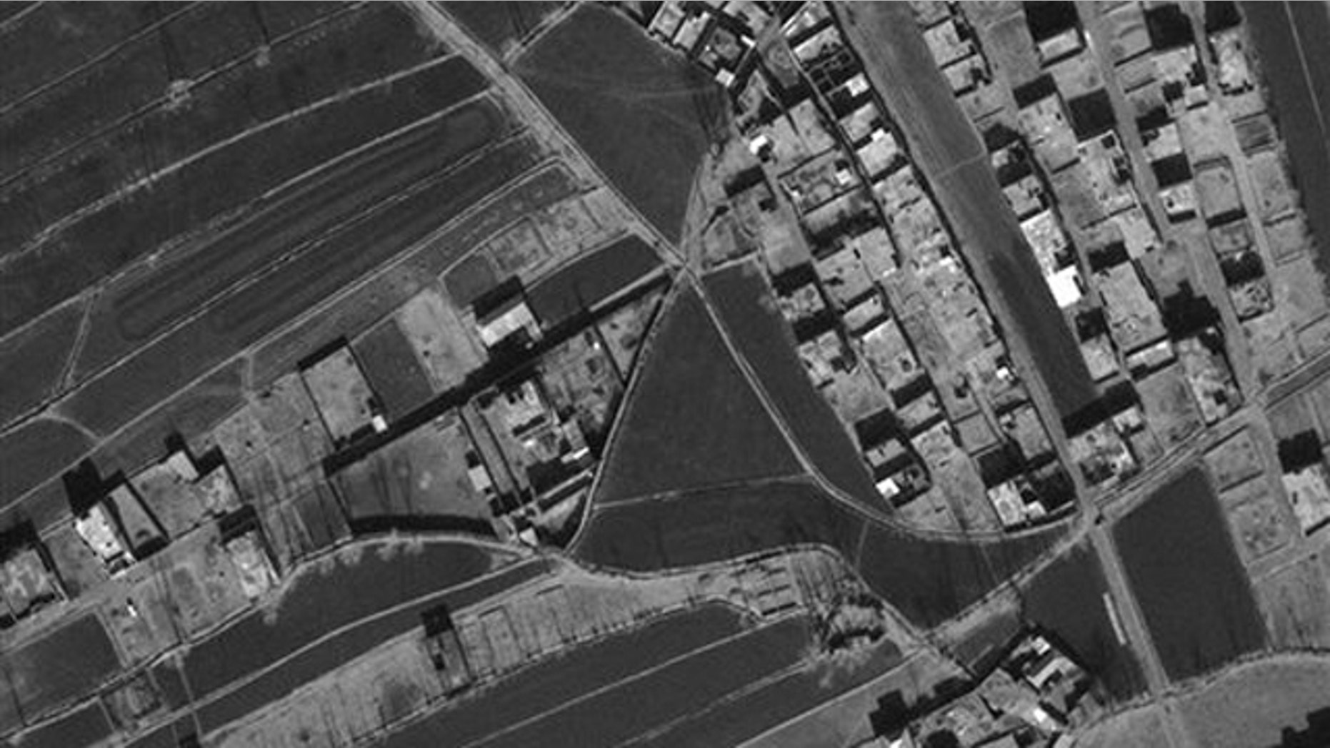This Jan. 15, 2011 satellite image provided by DigitalGlobe shows the compound, center left, in Abbottabad, Pakistan, where Usama bin Laden lived.
