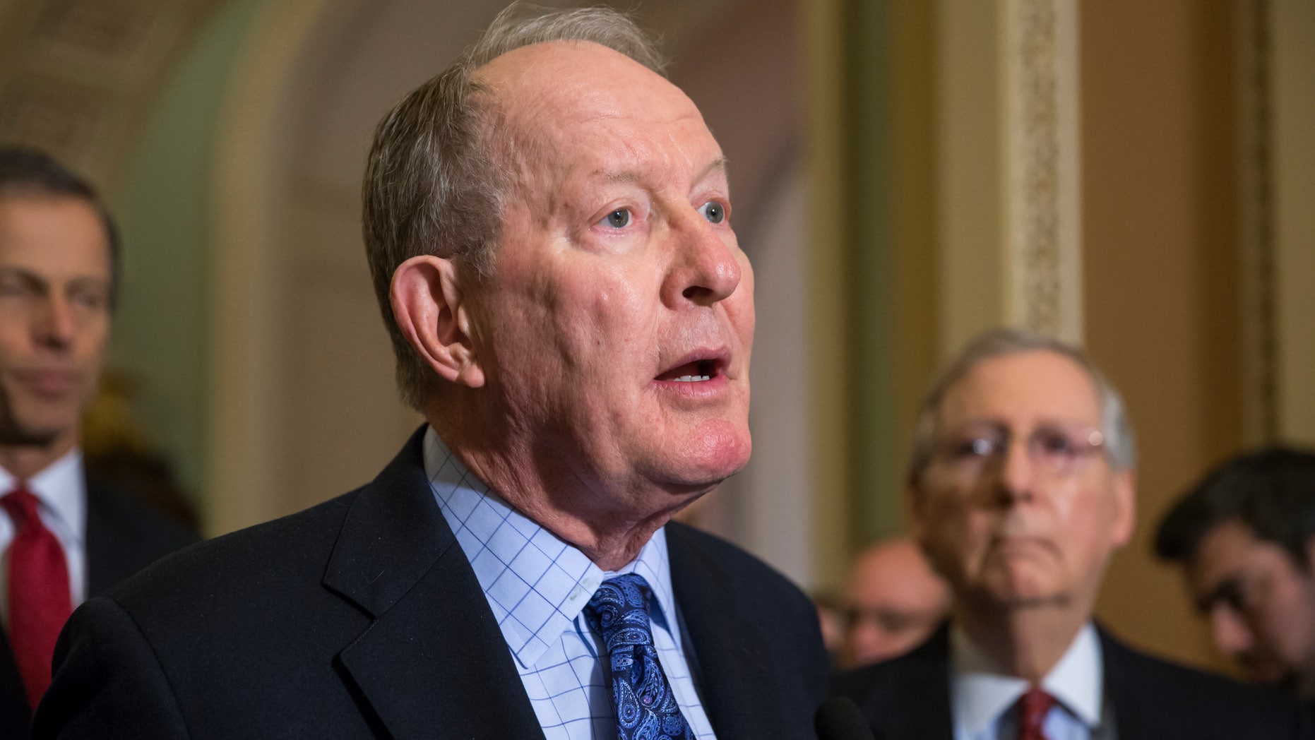 Dec. 8, 2015: Sen. Lamar Alexander, R-Tenn., chairman of the Senate Health, Education, Labor, and Pensions Committee, is joined by Senate Majority Leader Mitch McConnell, R-Ky., right, as he speaks to reporters after the Senate voted overwhelmingly to end debate on the makeover of the widely criticized No Child Left Behind Act, setting up a final vote.