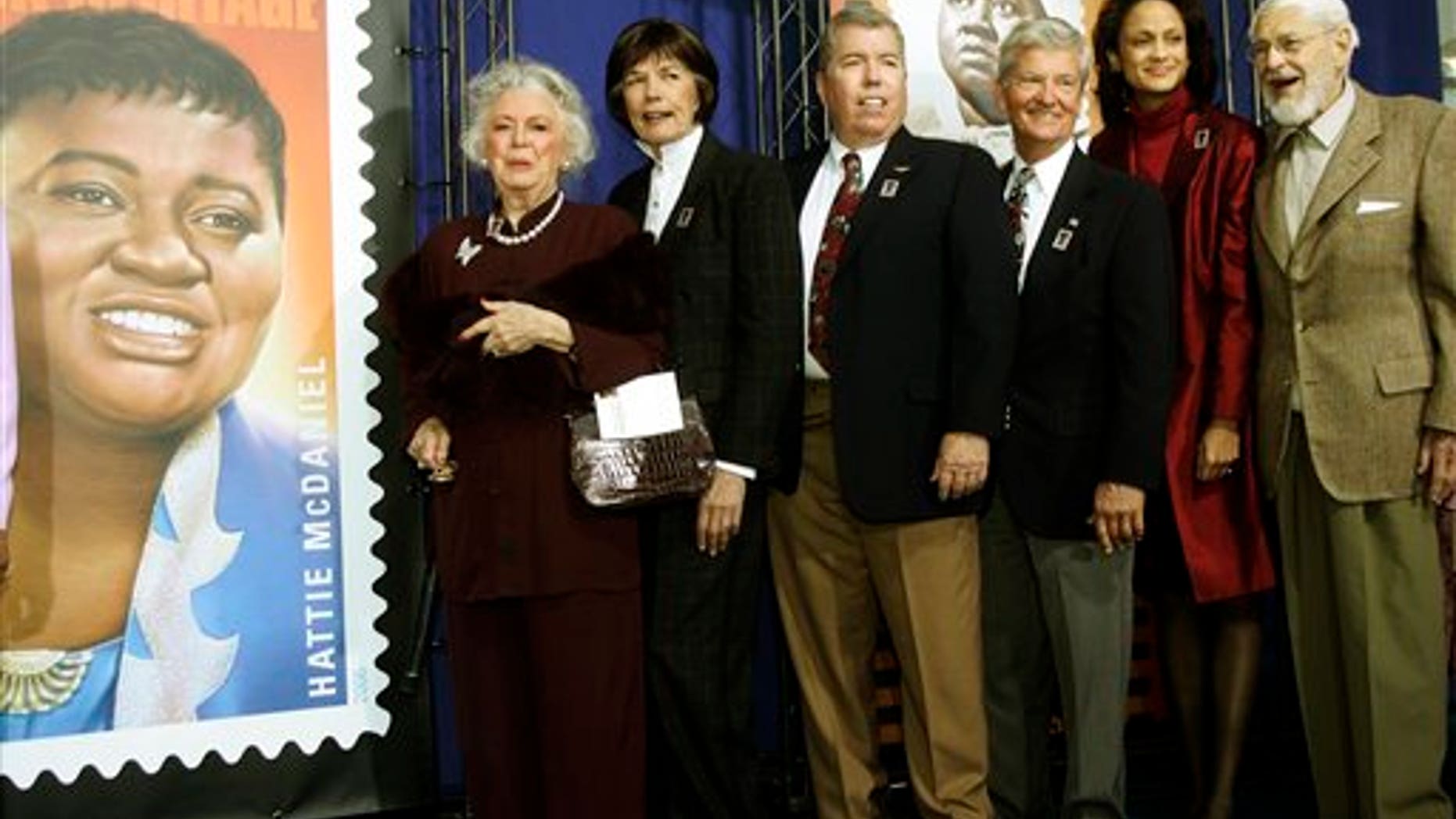 In this Jan. 25, 2006 photo, Ann-Marie Johnson, National First Vice President of the Screen Actors Guild second from right, joins Gone With the Wind cast, from left: Ann Rutherford, Cammie King Conlon, Mickey Kuhn, Patrick Curtis and Fred Crane to celebrate actress Hattie McDaniel's stamp. (AP)