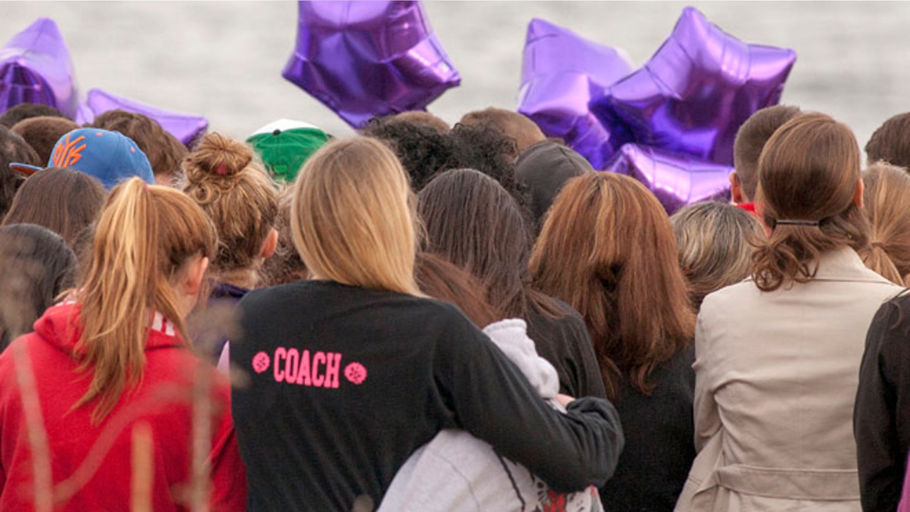 Apr. 25, 2014: People gather at the beach for a vigil in honor of murdered student Maren Sanchez in Milford, Connecticut.