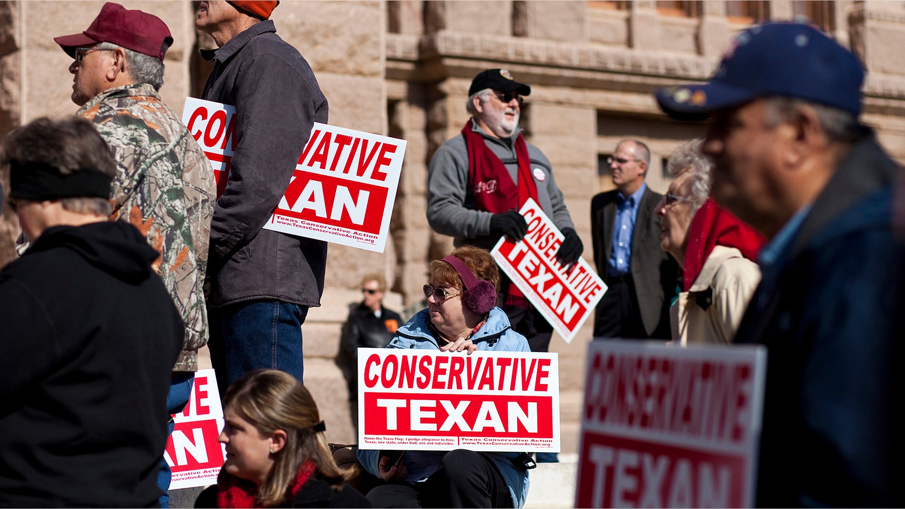 AUSTIN, TX- JANUARY 11: People belonging to the Tea Party movement convene at a rally at the Texas state capitol during the first day of the 82nd Legislative session on January 11, 2011 in Austin, Texas. The demonstrators picketed demanding true conservative values from elected officials. (Photo by Ben Sklar/Getty Images)