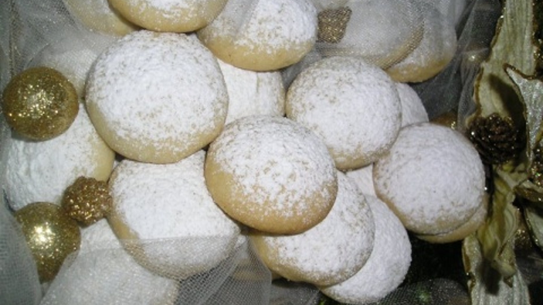 A Bulgarian baker was arrested after serving cocaine-sprinkled cookies to guests at a Greek funeral, news website Novinite reported Wednesday.