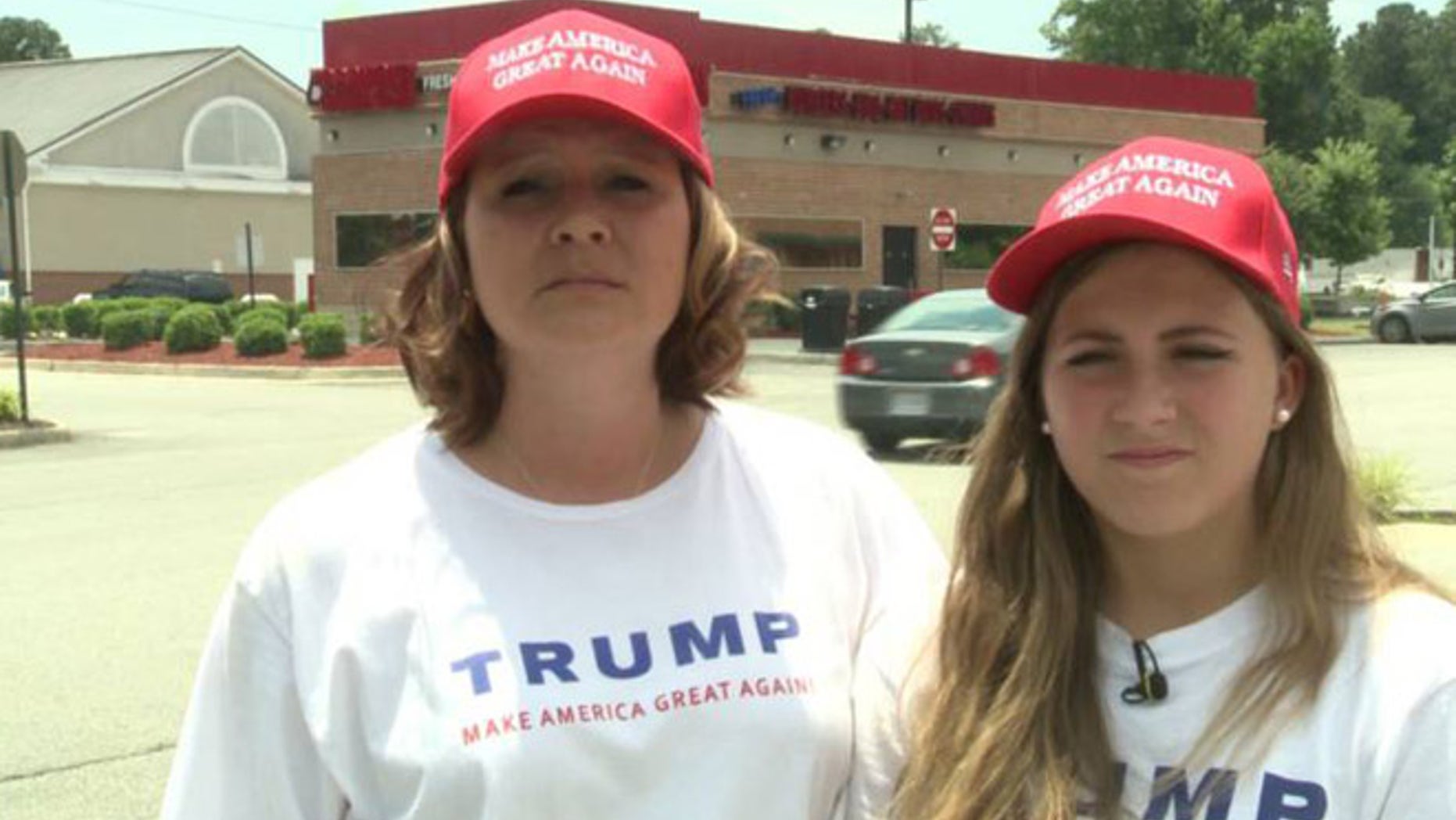 Riggs, (l.), and Wolfrey, (r.), just wanted a burger, but got a side of partisanship.