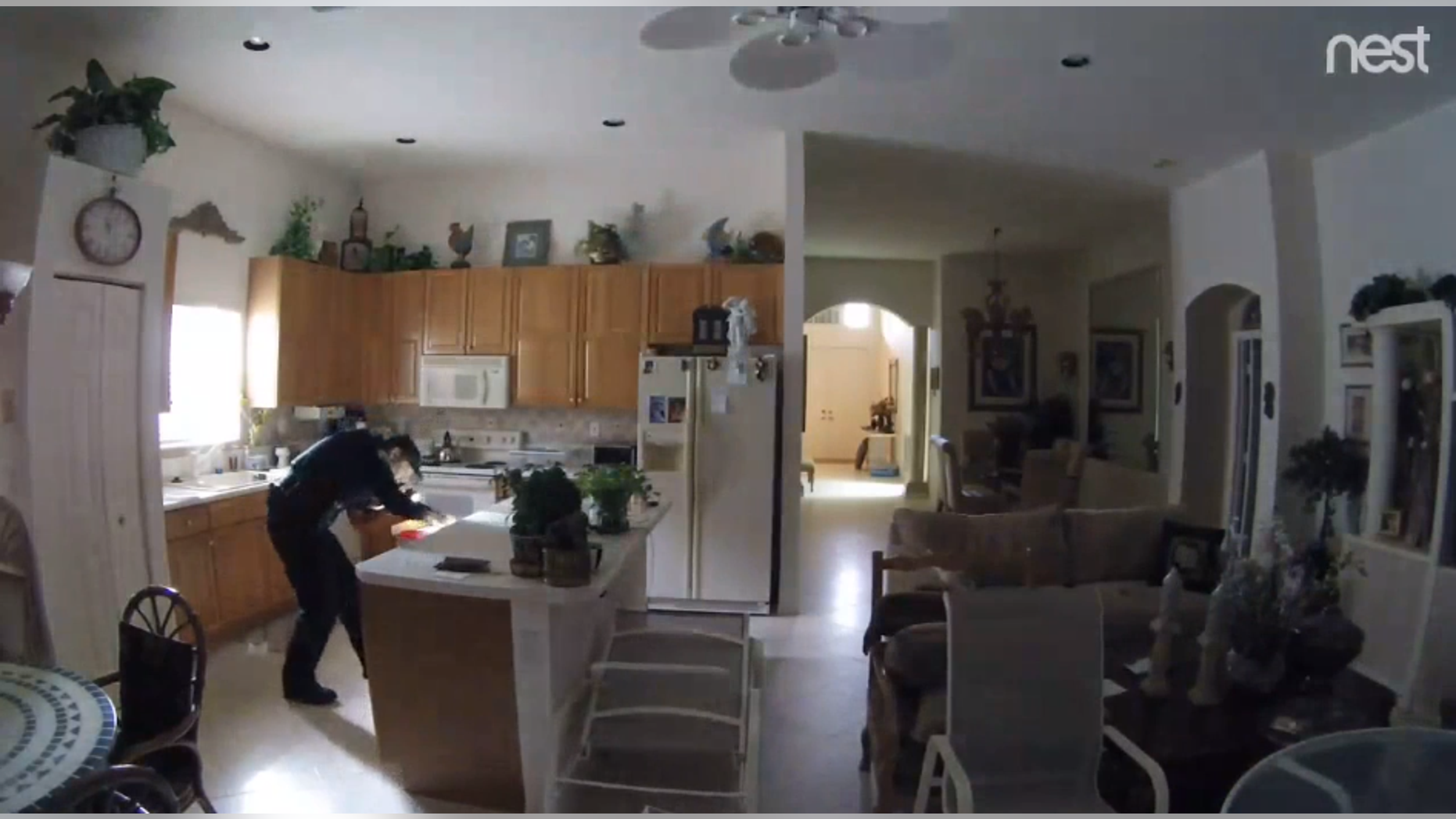 A Palm Beach Sheriff's deputy was arrested Thursday after he was caught on surveillance video breaking into the home of a recently deceased man.