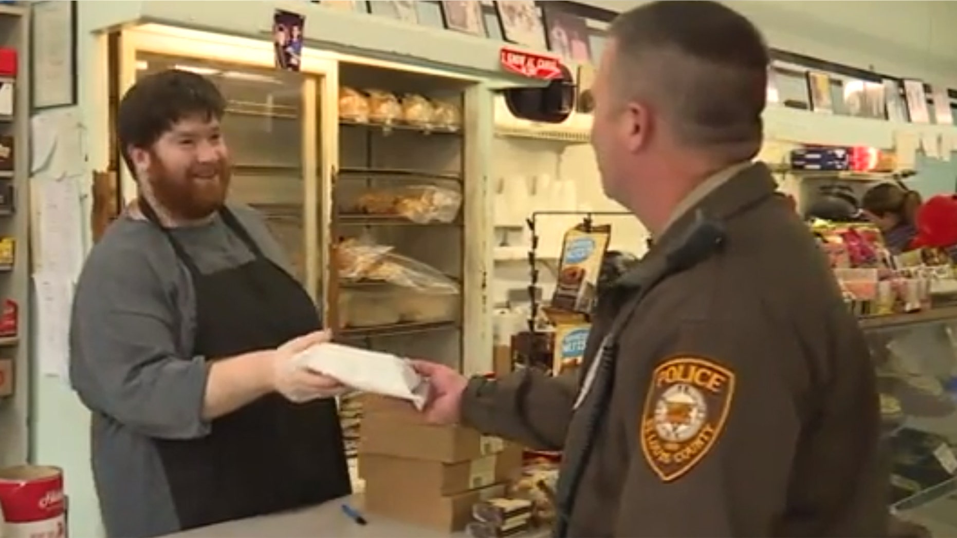 A "mystery man" is paying for local police officers at a deli in suburban St. Louis.
