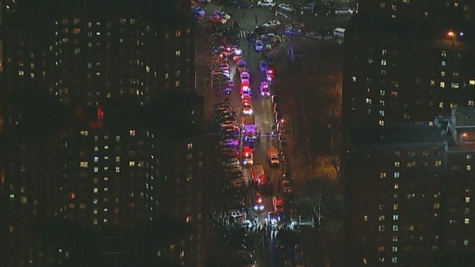 Two New York Police Department officers were shot in a public housing complex Thursday night.