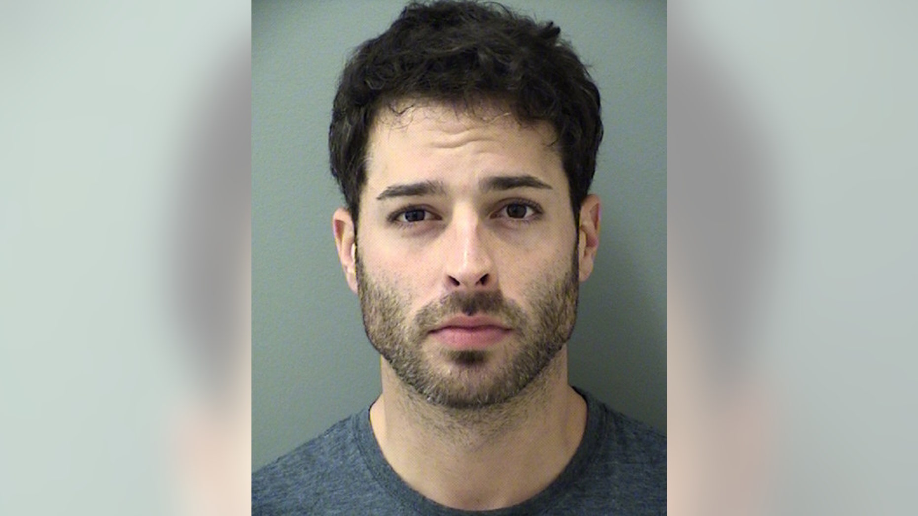 This undated photo provided by the Cherokee County, Ga., Sheriffs Office shows former soap actor Corey Sligh, who is charged with molesting a young girl. Sligh had a stint on the CBS soap opera, The Young and the Restless.