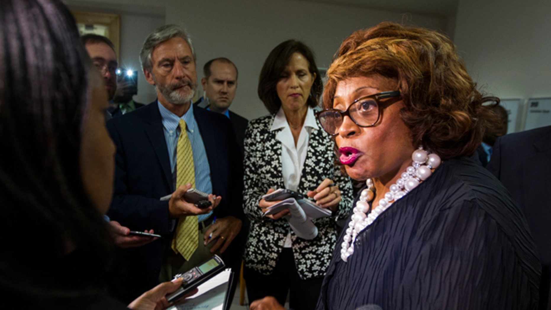 In this Aug. 13, 2015 file photo, Rep. Corrine Brown, D-Fla. talks with the press in Tallahassee, Fla.