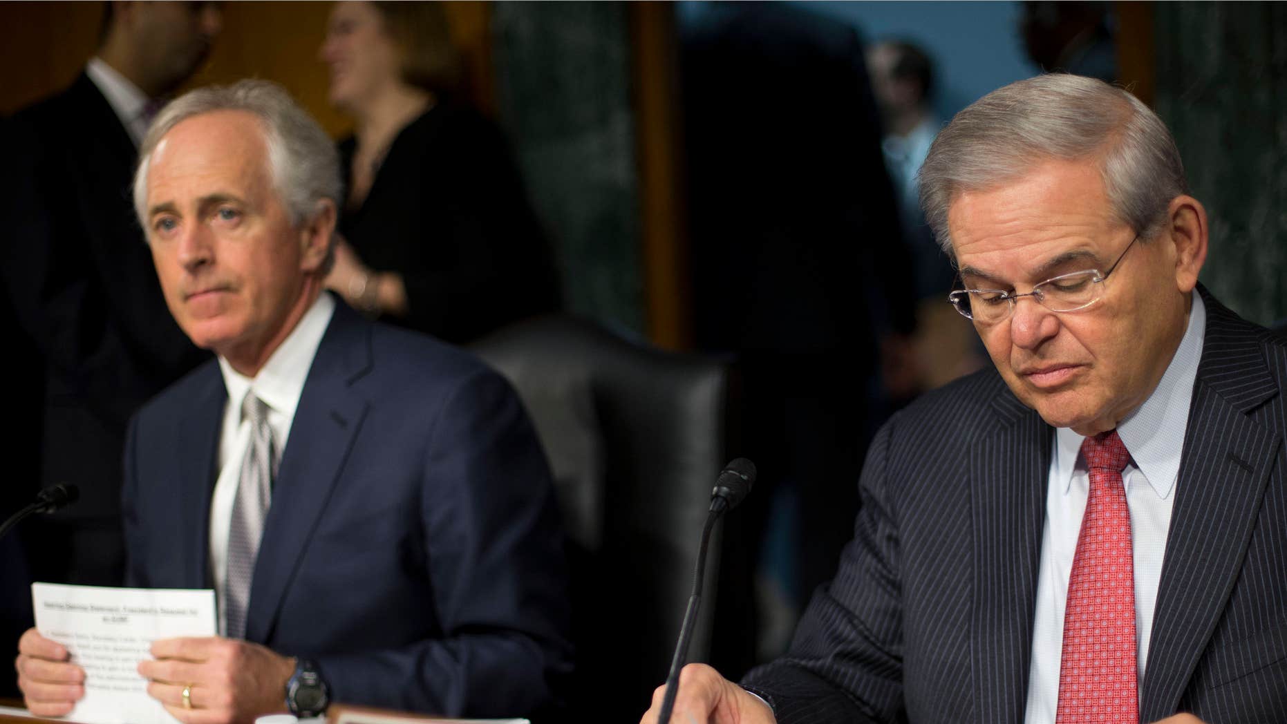March 11, 2015: Senate Foreign Relations Committee Chairman Sen. Bob Corker, R-Tenn., left, and the committee's ranking member, Sen. Robert Menendez, D-NJ., prepare for the committee's hearing on Capitol Hill in Washington.