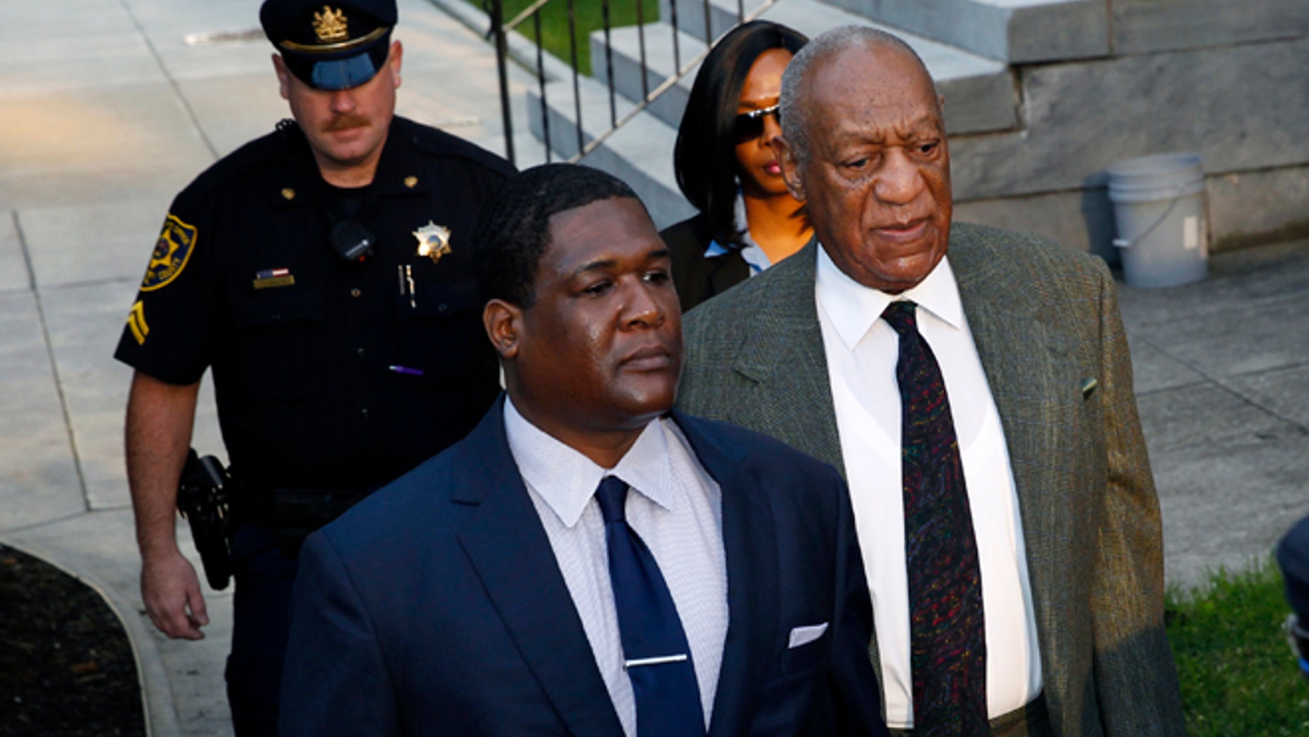Bill Cosby, right, arrives for a hearing in his sexual assault case at the Montgomery County Courthouse on Wednesday, Nov. 2, 2016, in Norristown, Pa.