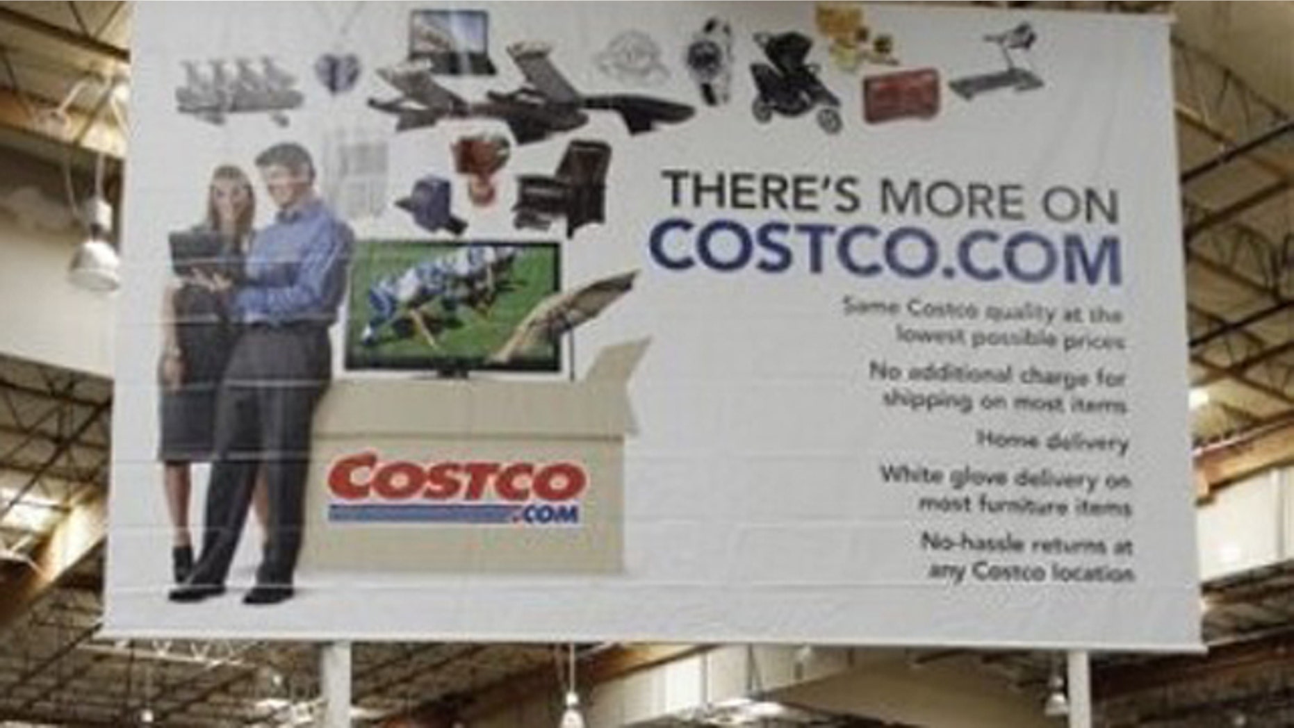 In this June 17, 2011, photo, a hot tub is on display in front of advertising for online service Costco.com at Costco in Mountain View, Calif. Costco has spent $2.3 million on an initiative that would privatize liquor sales in the state.