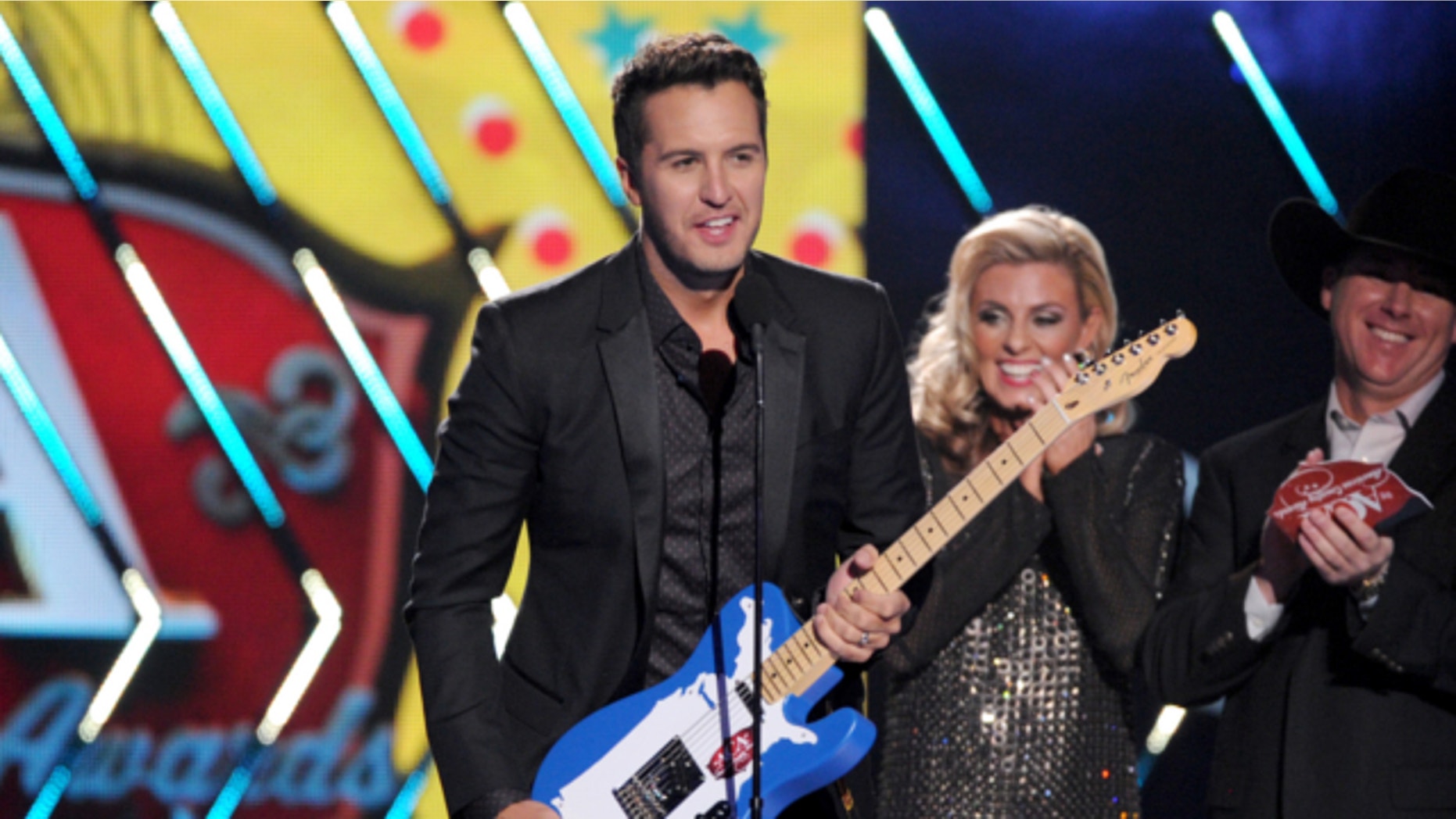 Dec. 10, 2013: Luke Bryan accepts the male artist of the year award onstage at the American Country Awards at the Mandalay Bay Resort & Casino in Las Vegas, Nev.