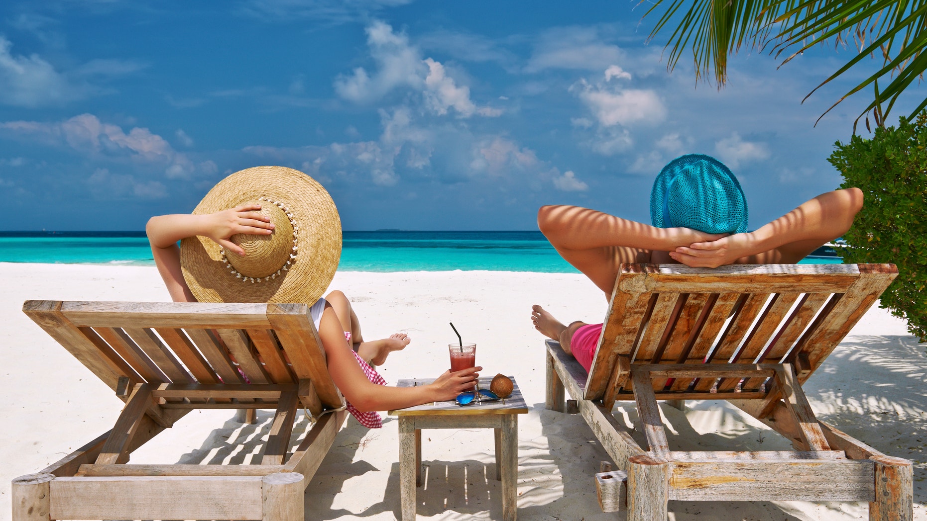 Couple on a tropical beach at Maldives