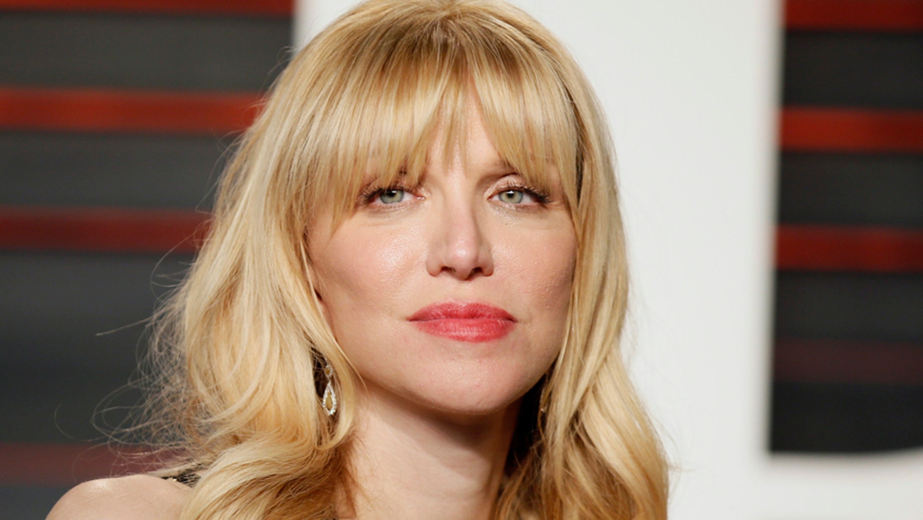 Courtney Love reportedly owes the IRS a ton of money.