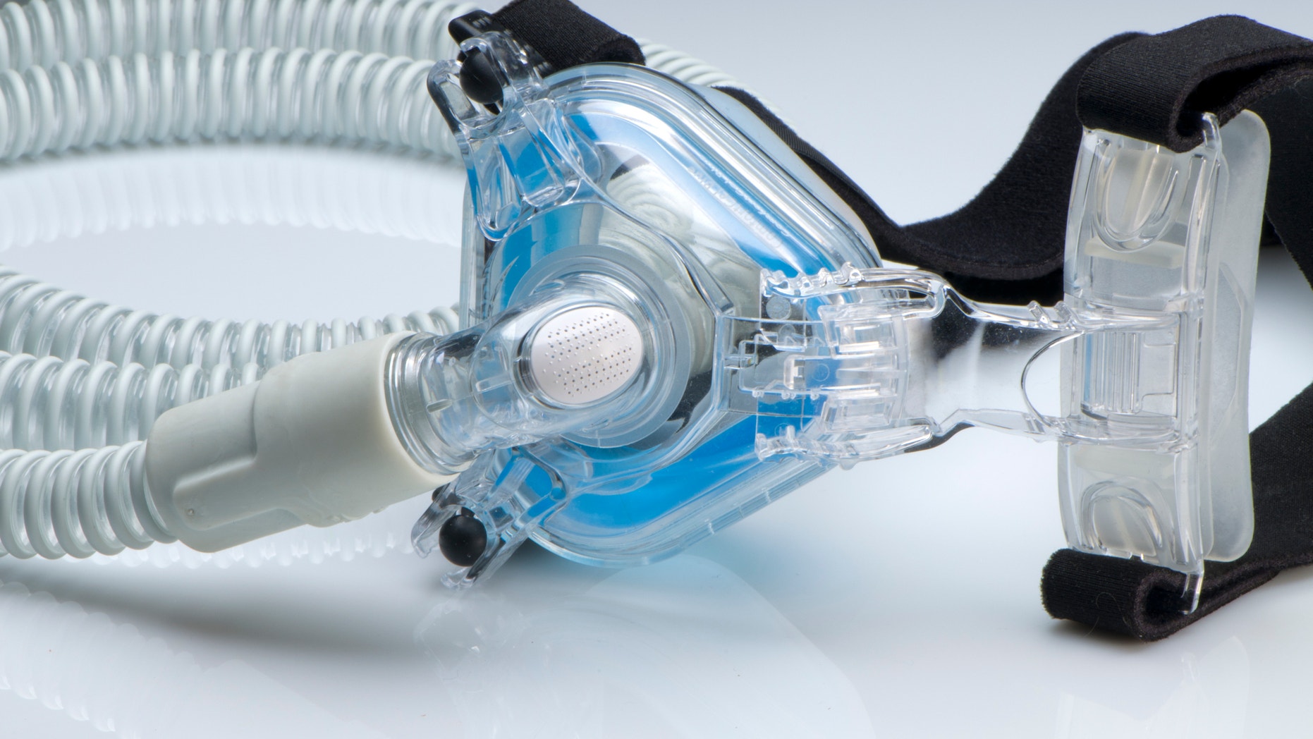 A CPAP face mask and hose.
