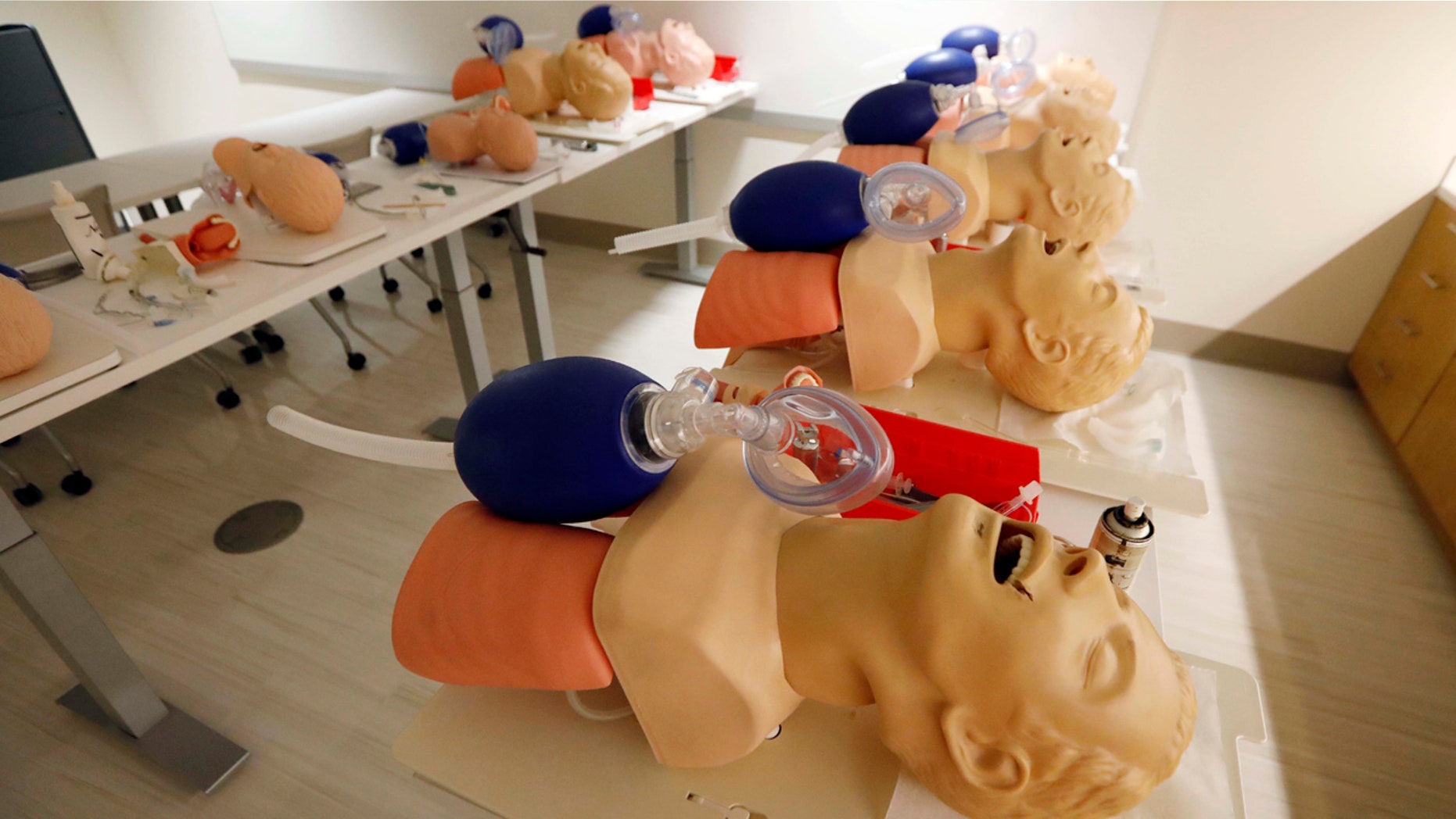 Male mannequins are arranged to train incoming medical students in CPR, in Jackson, Miss., Aug. 4, 2017.