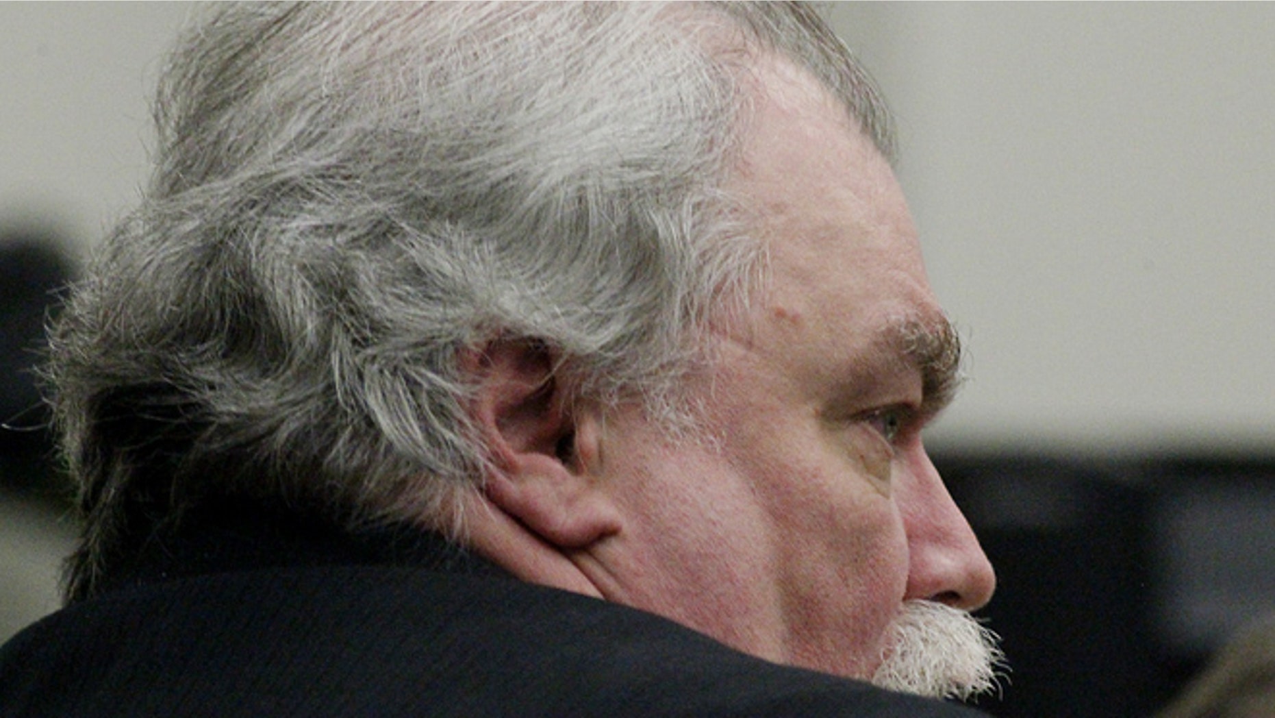 March 11, 2013: Defendant Richard J. Beasley listens to the closing statements and jury instructions during his trial in Summit County Judge Lynne S. Callahan's court on Monday in Akron, Ohio.