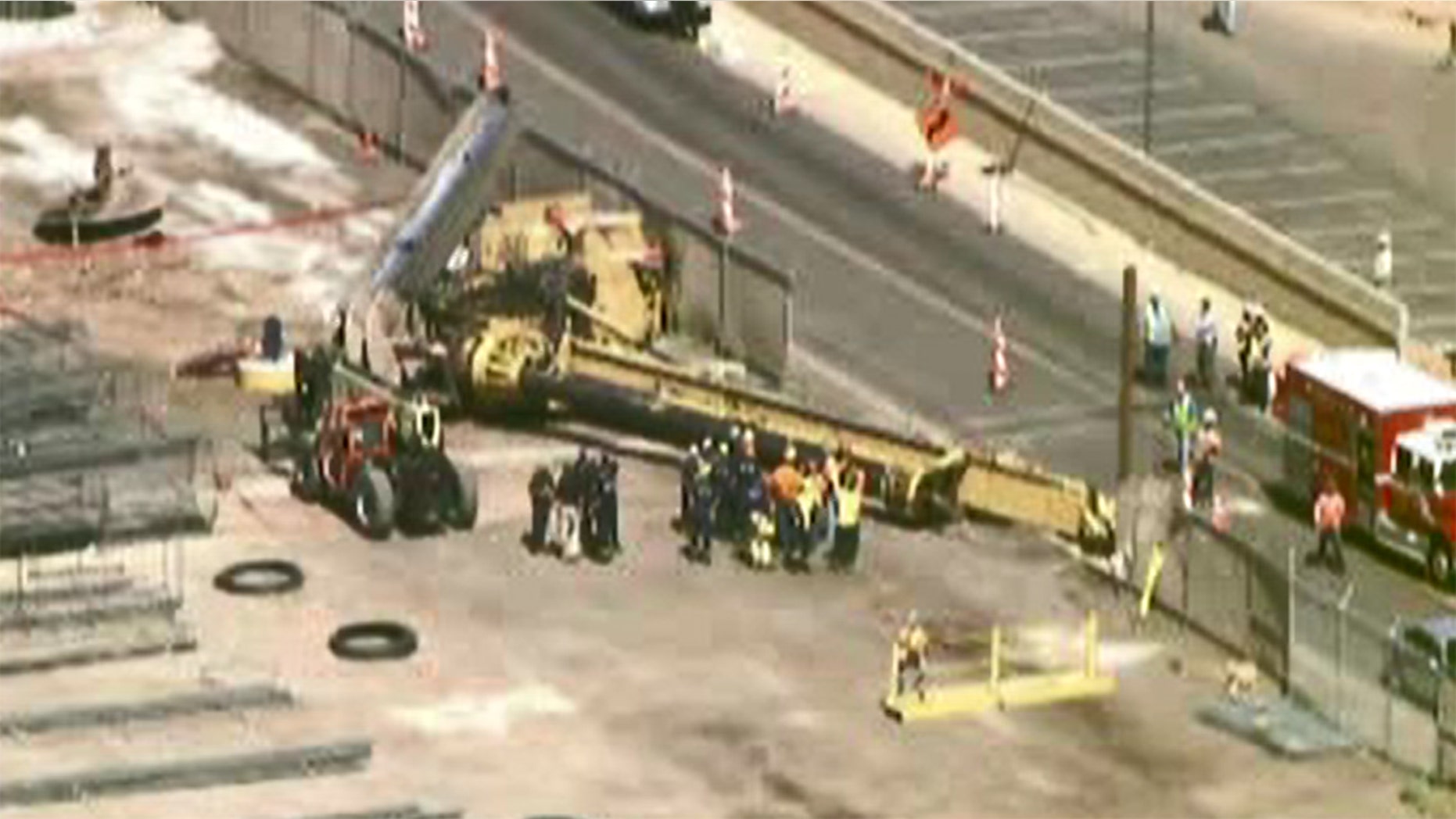 The crane was being utilized for construction of the airport's PHX Sky Train.